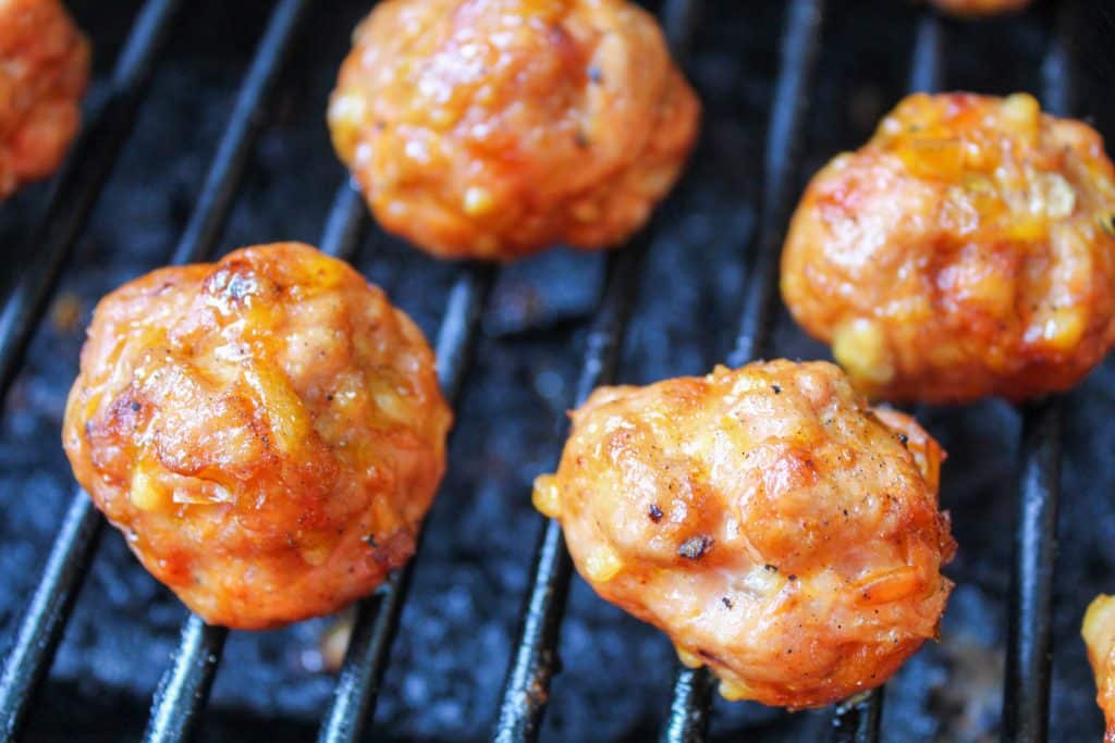 smoked meatballs on a grill
