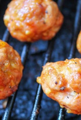 smoked meatballs on a grill