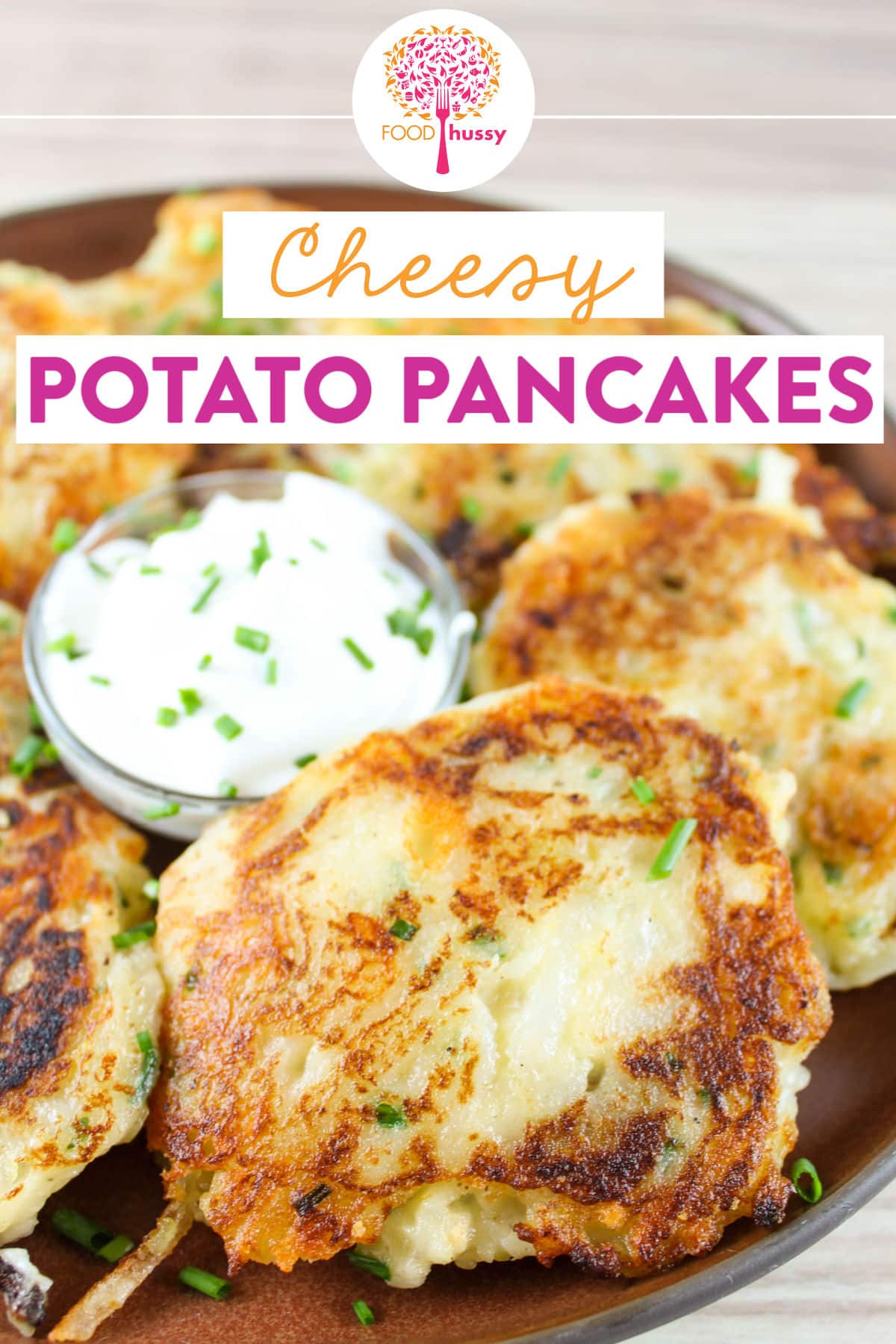 These White Cheddar Cheese Potato Pancakes are great for St. Patrick's Day or any time of the year! A great way to use leftover mashed potatoes, these potato pancakes are great as a side dish for dinner or a new take on hash browns for breakfast! via @foodhussy