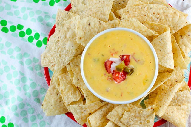 I finally have the actual recipe for my favorite queso on the entire planet! For 15 years, everytime I go home to Iowa - I have made my friends go to Carlos O'Kelly's - just so I can eat this queso. Now - I CAN MAKE IT MYSELF! I had to share!!!