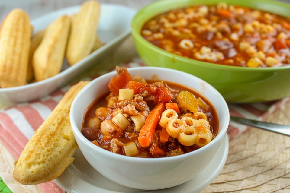 This Olive Garden Pasta Fagioli recipe will have you feeling like you just walked into the garden of olives! It's like an Italian version of chili with sausage, carrots, onion, celery, tomatoes, beans and so much more! It's a perfect copycat recipe and tastes exactly like the real thing. It's my favorite soup to make!