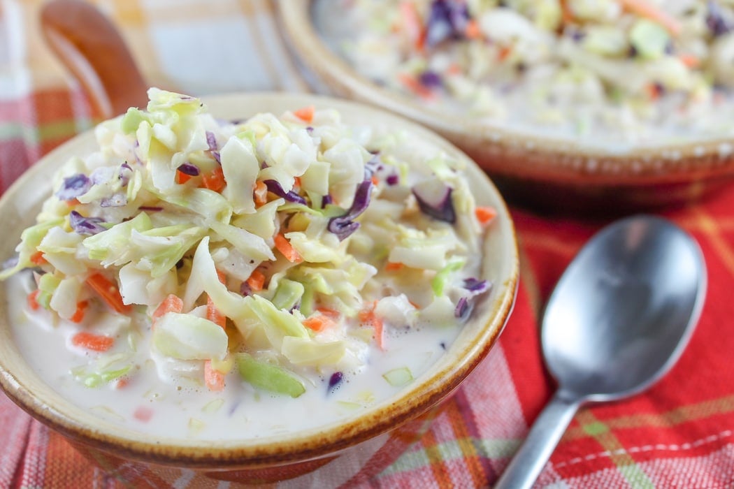 KFC Coleslaw has always been my favorite restaurant side dish! It's got a creamy dressing that is a little sweet and very simple. With spring here, I have been craving coleslaw and made this simple copycat KFC Coleslaw recipe in minutes!