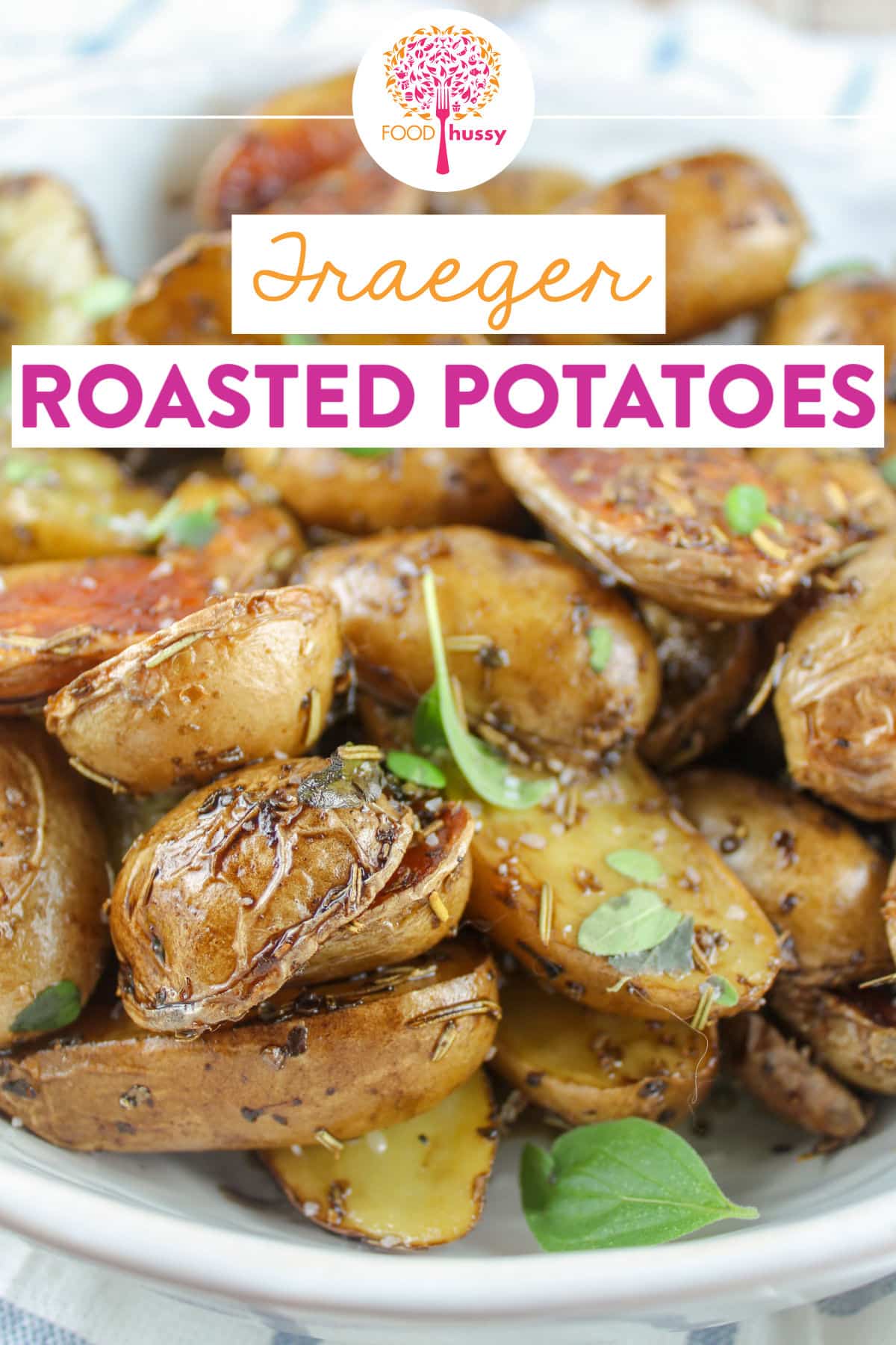 Traeger Roasted Potatoes are a delicious smoky side dish great for any weeknight meal!  A little olive oil and fresh herbs are all you need! via @foodhussy