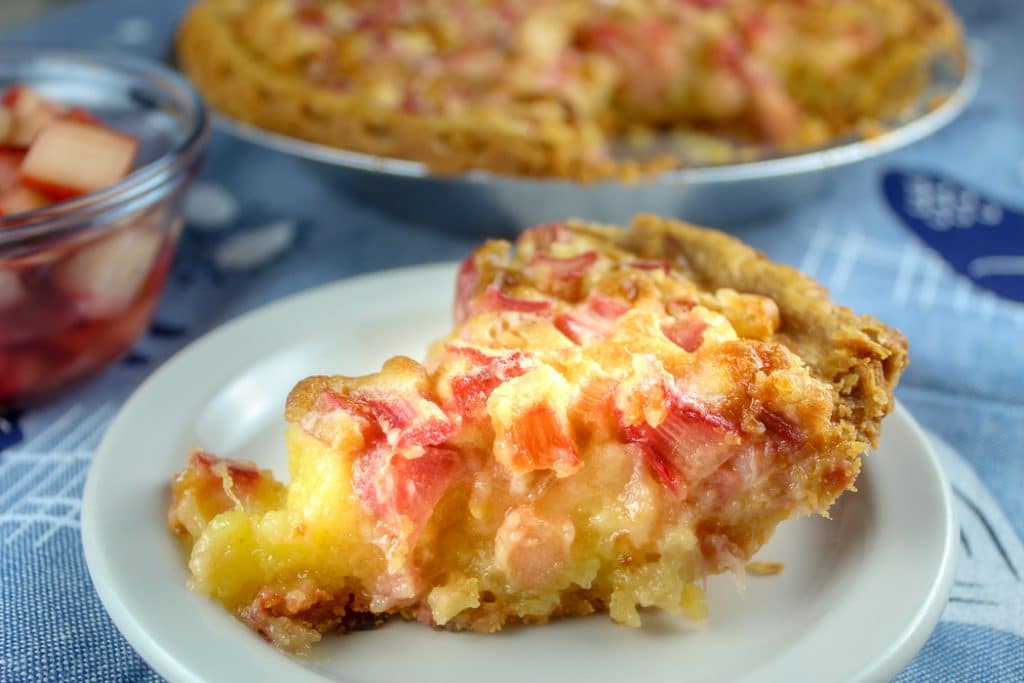 Rhubarb Custard Pie is my absolute favorite pie - the tart rhubarb mixed with lots of sugar and a creamy custard is just decadent! It is also a very special dessert recipe because my Dad made it every year for my birthday. 