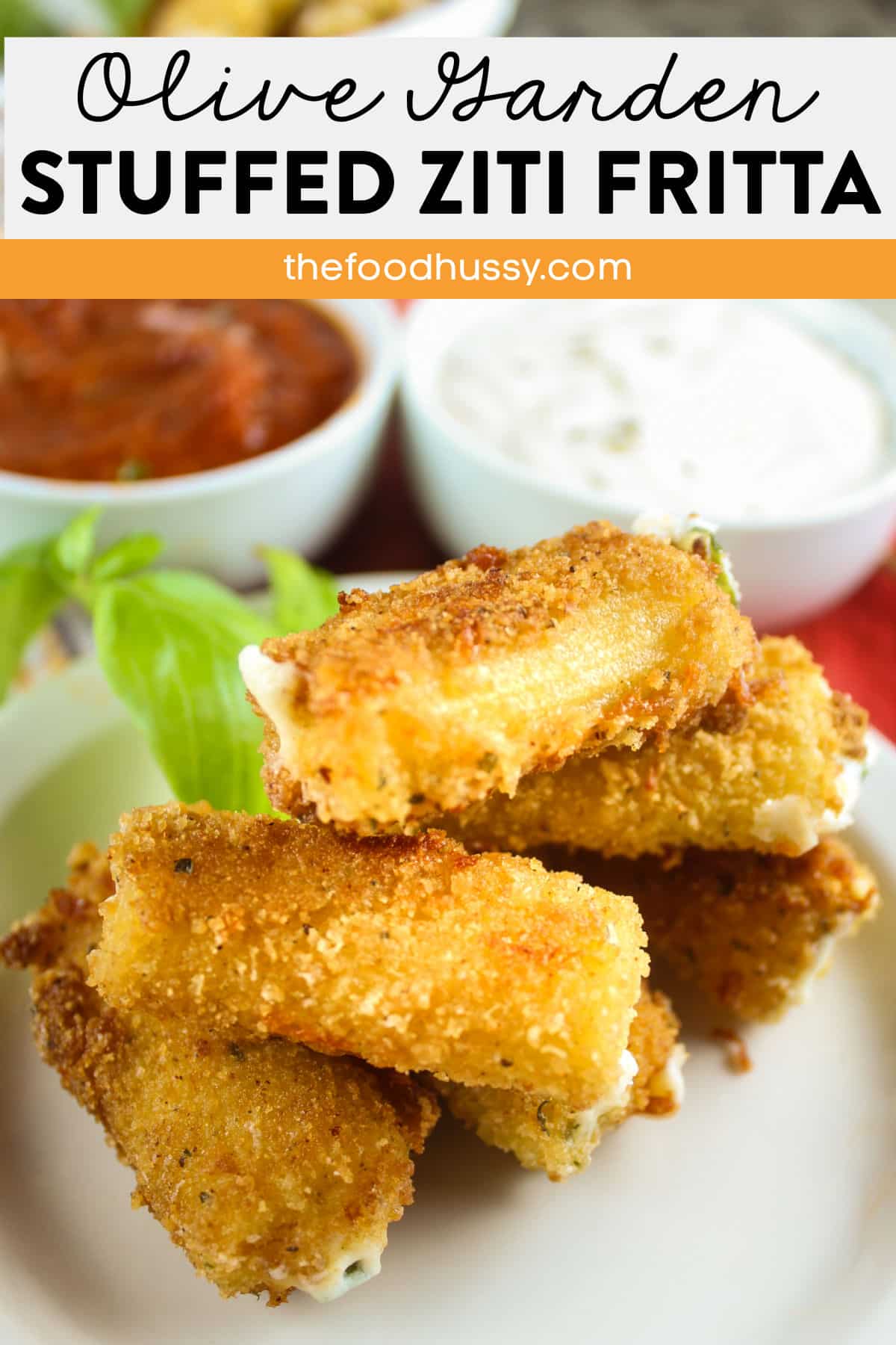 Olive Garden Stuffed Ziti Fritta is my favorite Olive Garden appetizer! Cheese filled noodles - breaded, fried and dipped in alfredo & marinara - yum! How can you say anything but YUM?! via @foodhussy