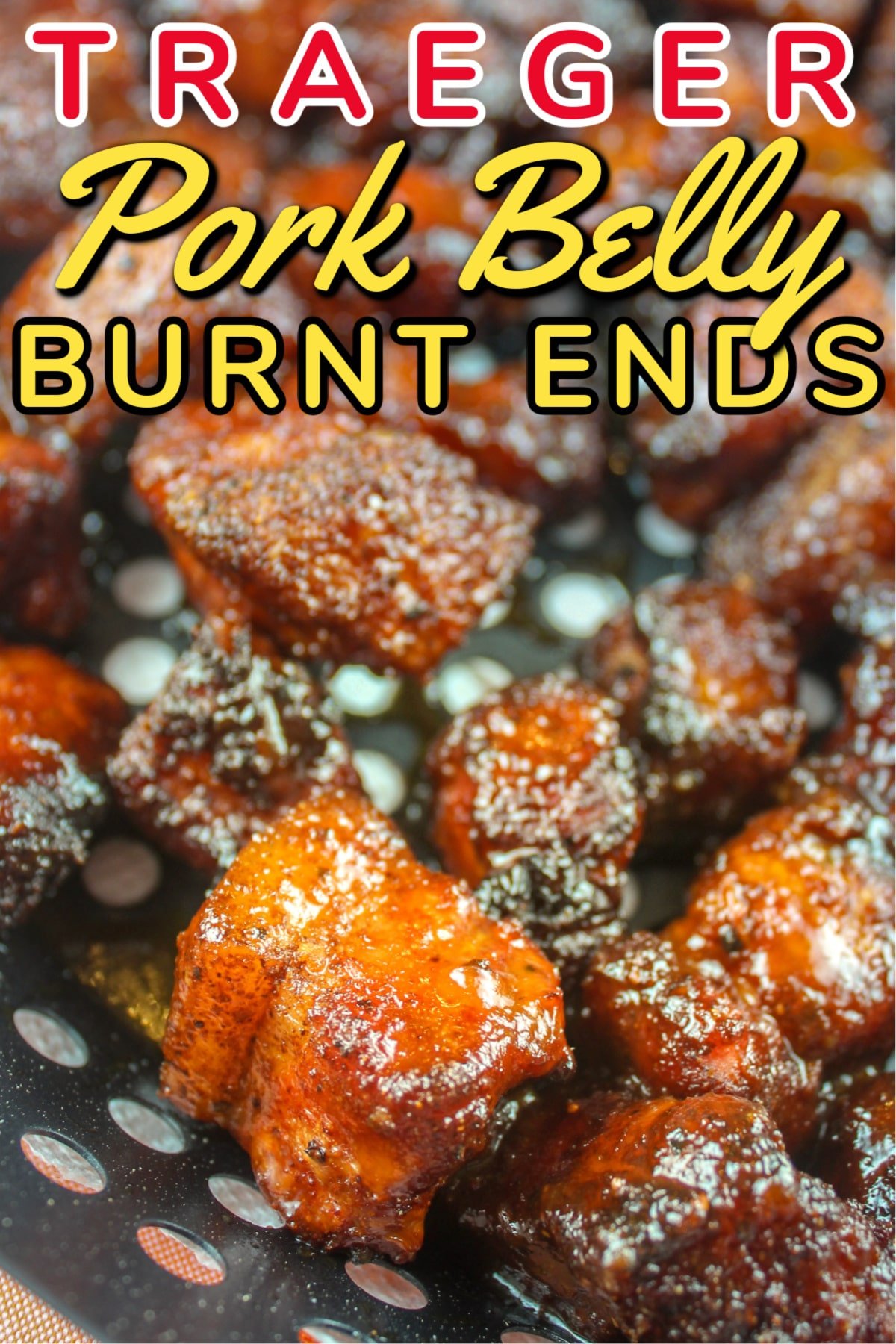 Smoked Pork Belly Burnt Ends are like little pieces of candy MADE OF BACON!!! They're sweet, savory, salty morsels of heaven! They're also a lot easier than you think - I made them on my Traeger Grill and they melt in your mouth! Perfect for your next get-together - or heck - just eat them all yourself!  via @foodhussy