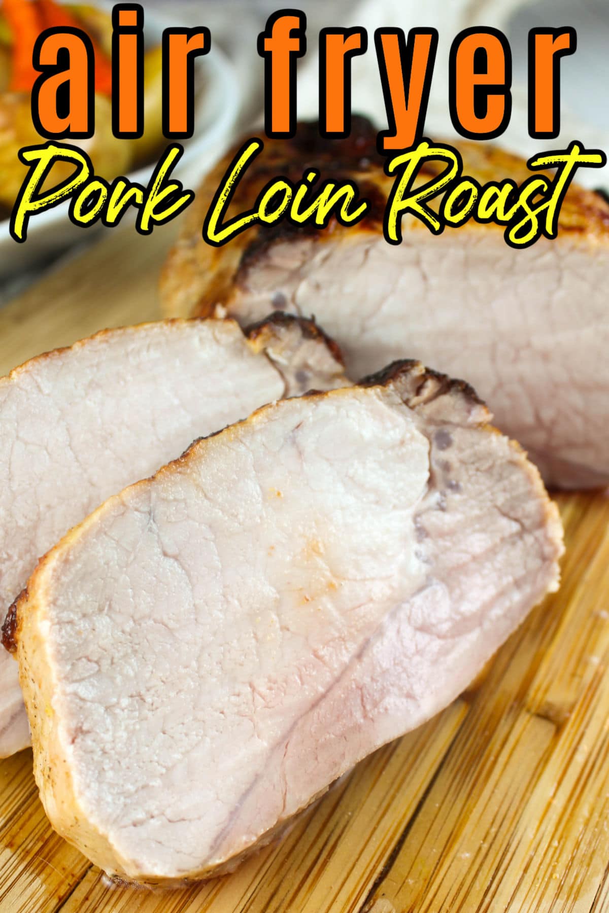 An Air Fryer Pork Roast is delicious and will make some of the juiciest boneless chops you've ever eaten. It's very simple too - just marinate and air fry! Throw in some potatoes and carrots and you've got the whole meal in 40 minutes.  via @foodhussy