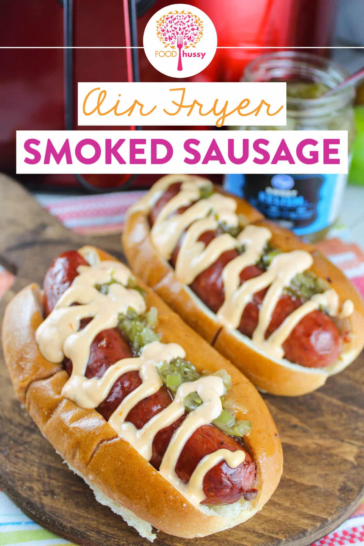 Air Fryer Smoked Sausage (or Kielbasa) just made your life so much easier! Dinner is served in less than 10 minutes!! You can serve it up on a bun like a giant, fancy hot dog or slice it up and air fry with onions and peppers for a yummy entree that's great over rice. via @foodhussy