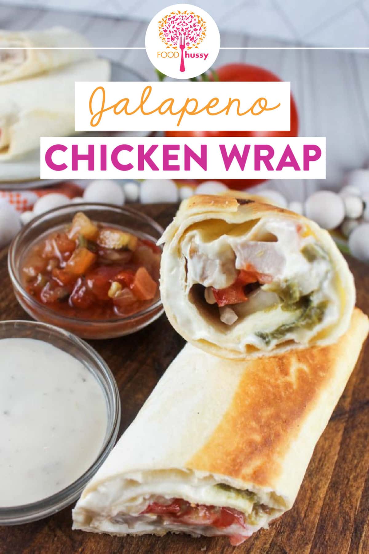 This Jalapeno Chicken Wrap is a copycat of my favorite lunchtime treat! This copycat of the Roly Poly Chicken Popper Wrap is filled with chicken, cream cheese, jalapenos and fresh vegetables! It's an easy dinner recipe and you're saving calories too!  via @foodhussy