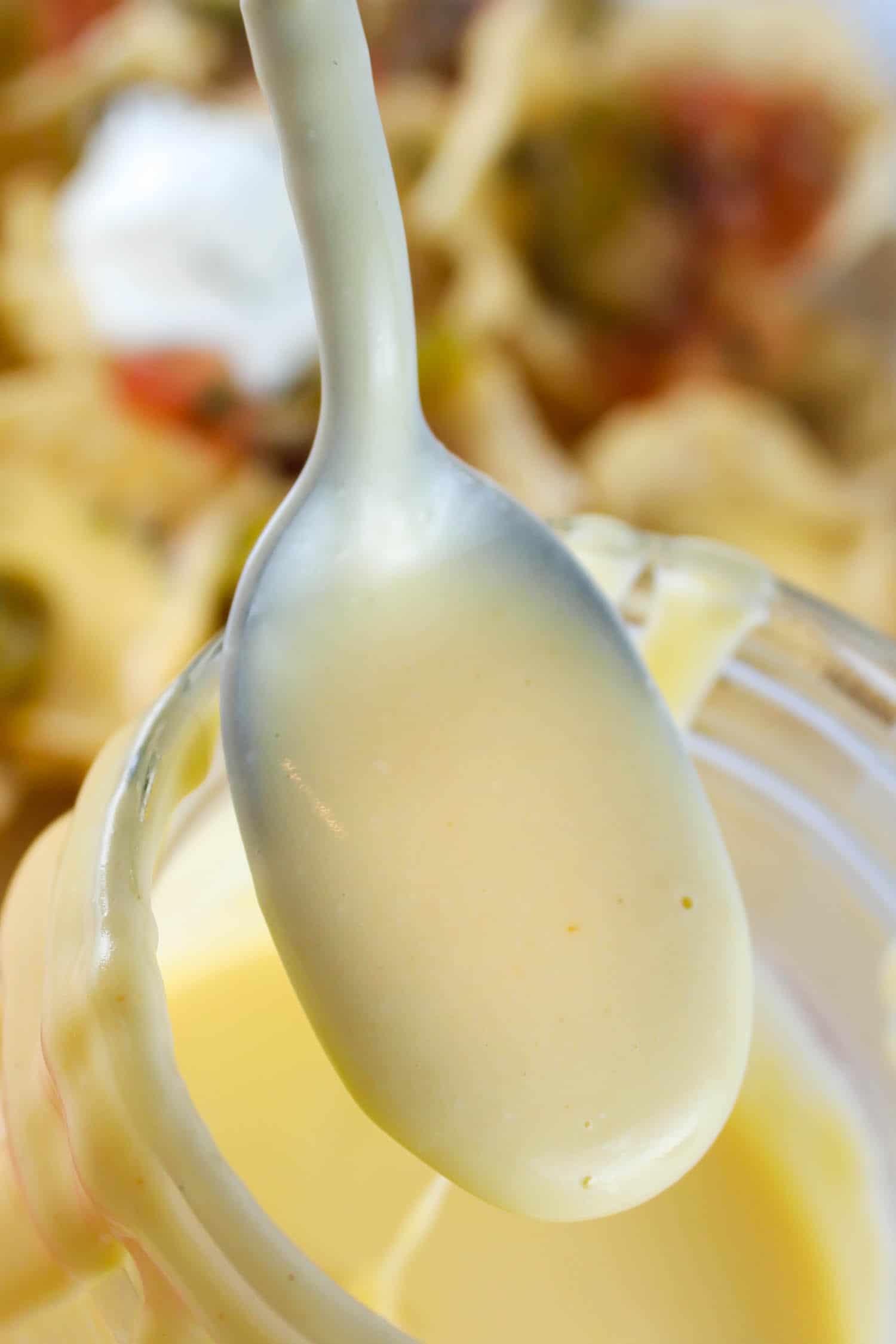 Flourless cheese sauce is melty and delicious - and best of all - cheesy!!! I love cheese sauce but so many of them use flour and I don't like that taste so I wanted to make a flourless cheese sauce that I can use on nachos, pasta and even pizza! via @foodhussy