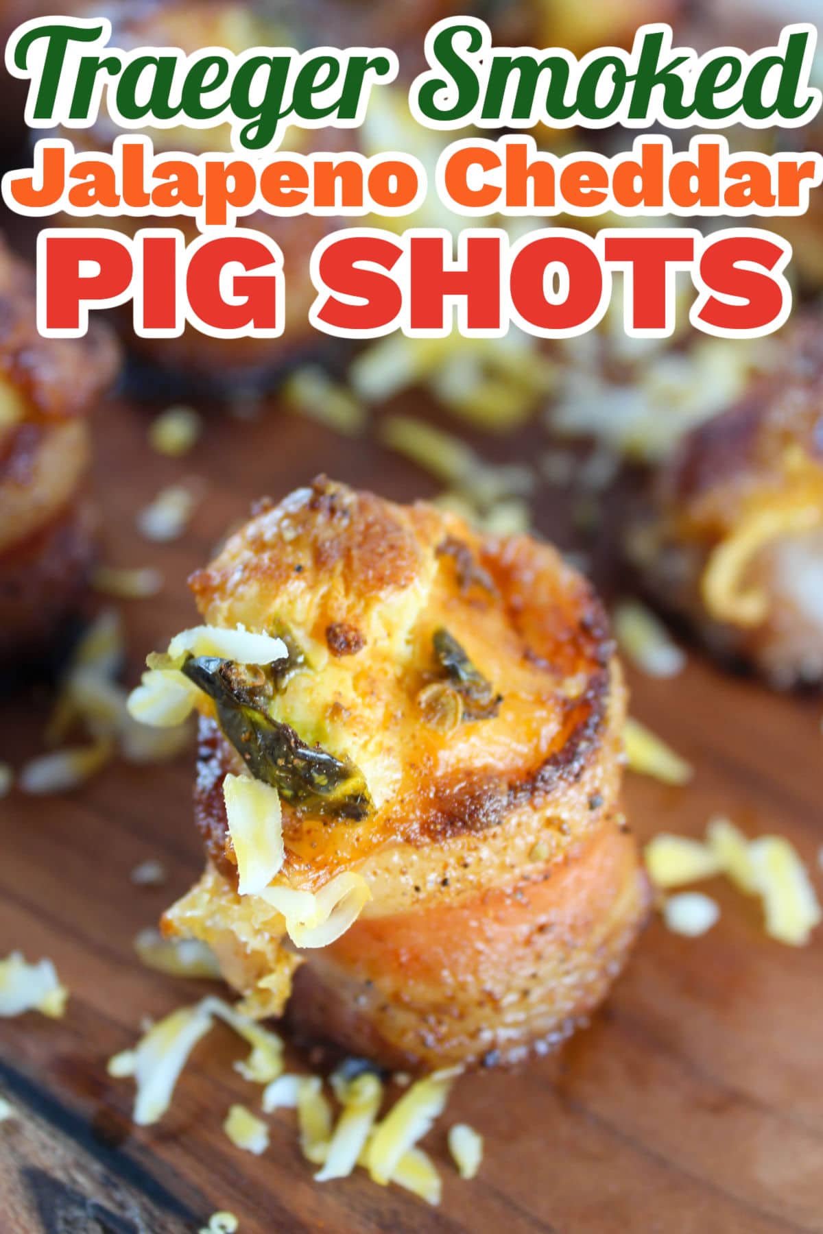 Smoked Pig Shots on the Traeger are the latest and greatest appetizer! Bacon "shot glasses" filled with smoked sausage, cream cheese and more! These are great for any summer barbecue, tailgating or holiday get-together.  via @foodhussy