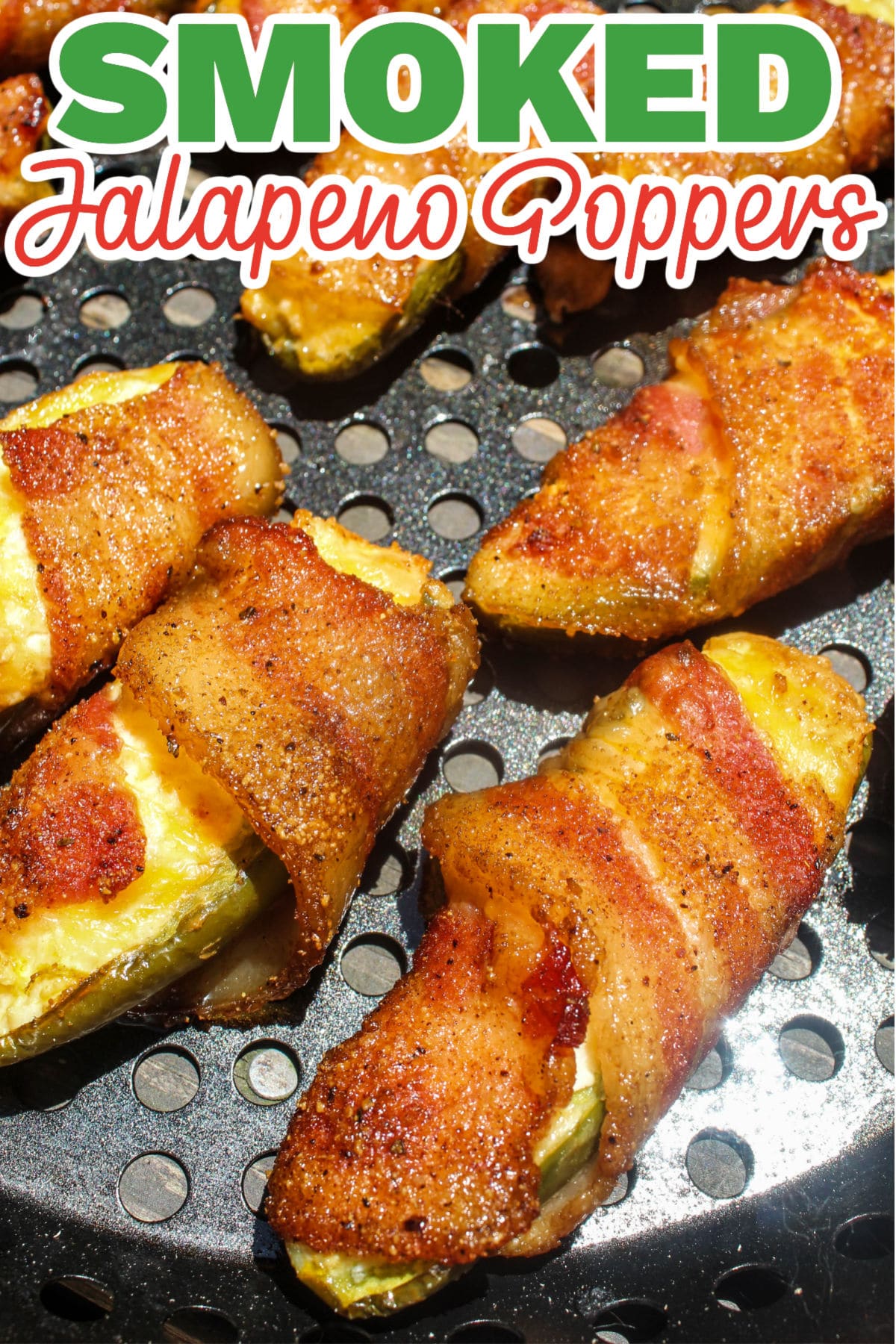 These Smoked Jalapeño Poppers are a delicious twist on a classic popper recipe. First twist: wrapping the poppers in bacon - this adds meatiness which absorbs that smoke even more!  via @foodhussy