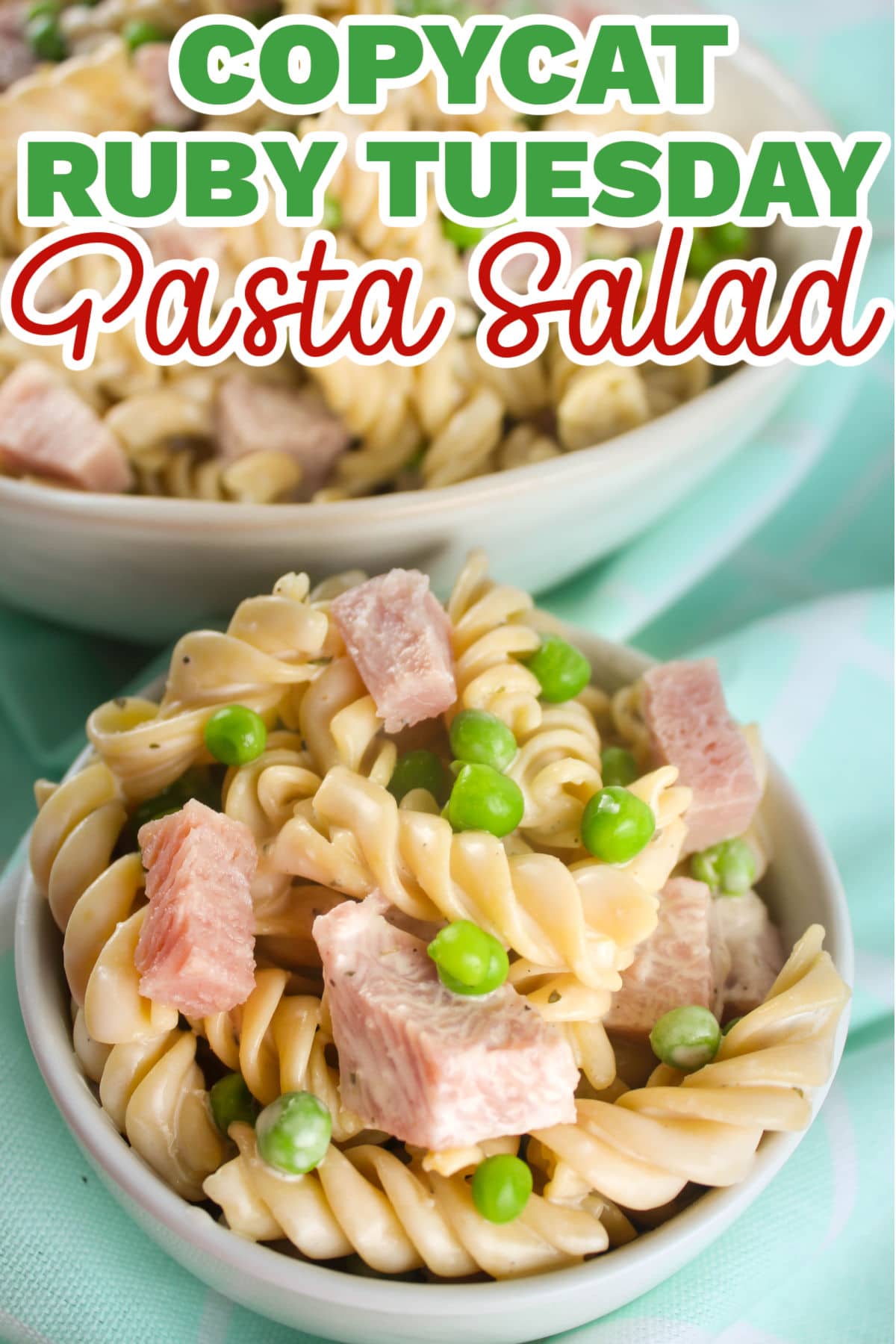 Ruby Tuesday's Pasta Salad is famous and so delicious and simple! This copycat recipe has all the essentials with rotini pasta, diced ham, peas and lots of ranch dressing!  via @foodhussy