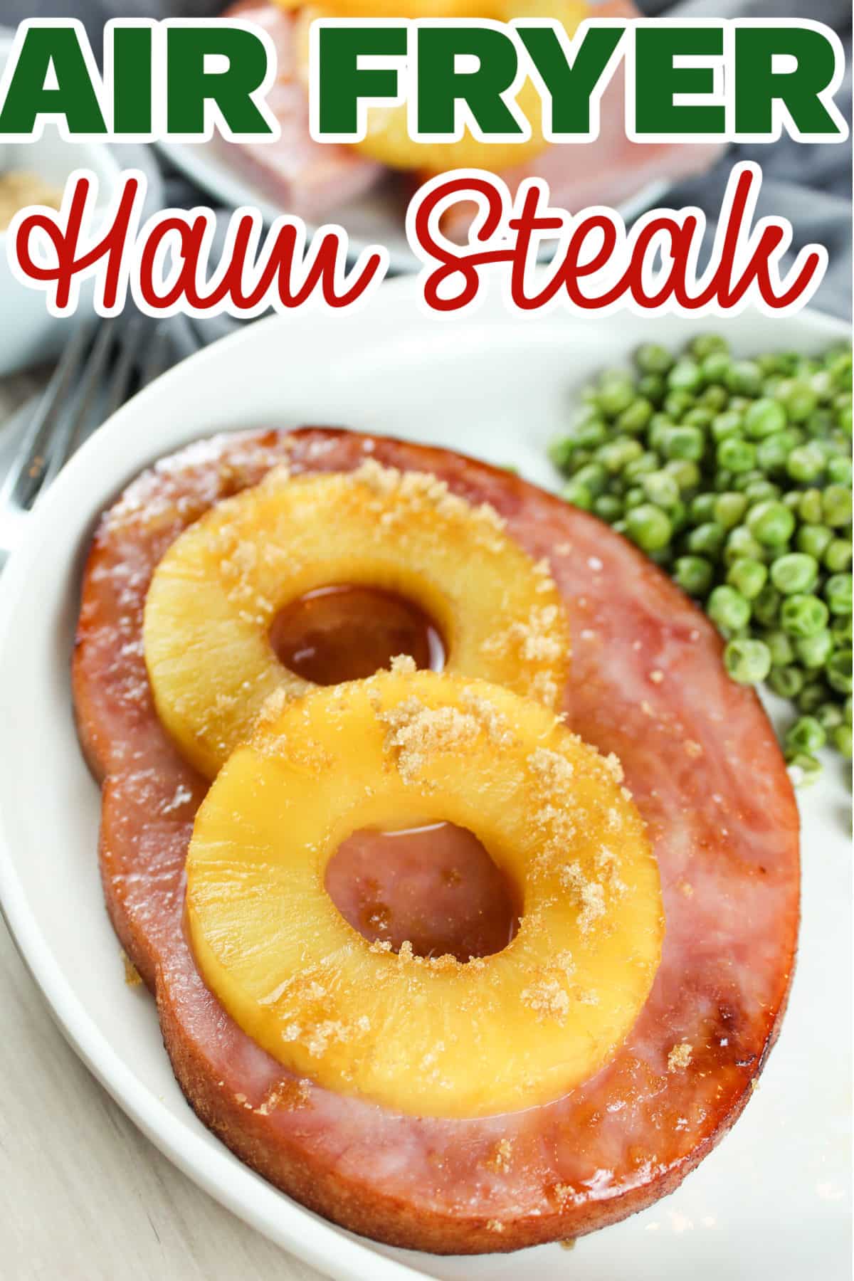 Air Fryer Ham steak is one of the most affordable dinners you can make. Because ham is already cooked, you can heat it up in just 10 minutes. Topped with brown sugar and pineapple - this dish brings the flavor of the holidays any time of year! via @foodhussy