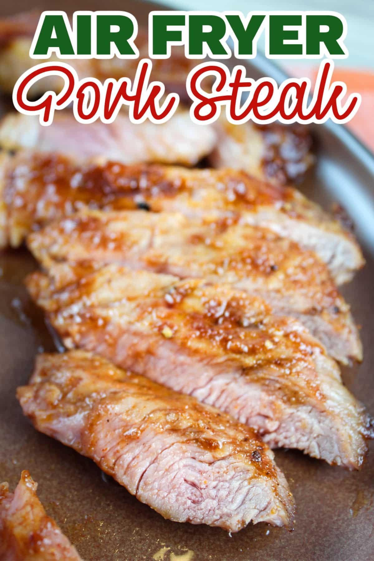 Pork Steak in the air fryer is not only a super quick supper - from fridge to table in just 15 minutes - it's also delicious and juicy! Pork steak is a little more forgiving than a boneless pork chop so it's tender every time. Add a little bbq seasoning and you're done! via @foodhussy