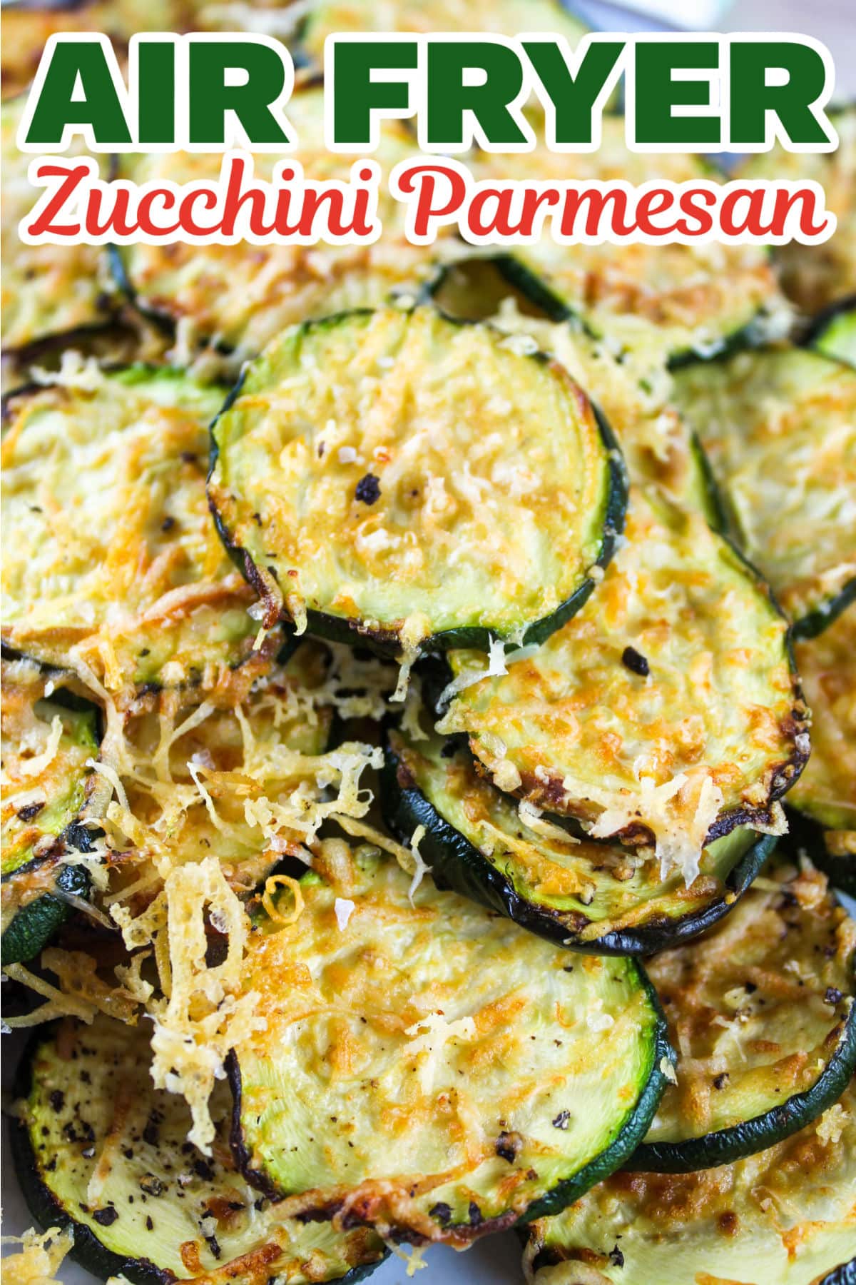 Air Fryer Zucchini Parmesan is a super quick (and guilt-free) side dish that changes zucchini from bland to delicious! These little zucchini crisps are crunchy, cheesy and zippy from a little brush of dijon mustard.  via @foodhussy