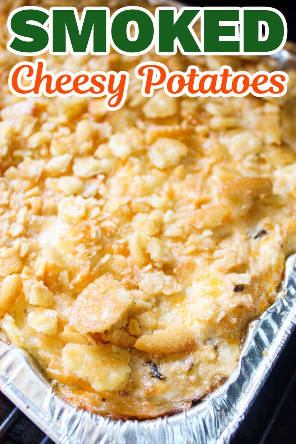 Traeger Smoked Cheesy Potatoes are the perfect side dish for any family meal. Cheesy Potatoes are easy to make and loaded with frozen hash browns, two kinds of shredded cheese, sour cream, diced onion (for a little crunch) and more!  via @foodhussy