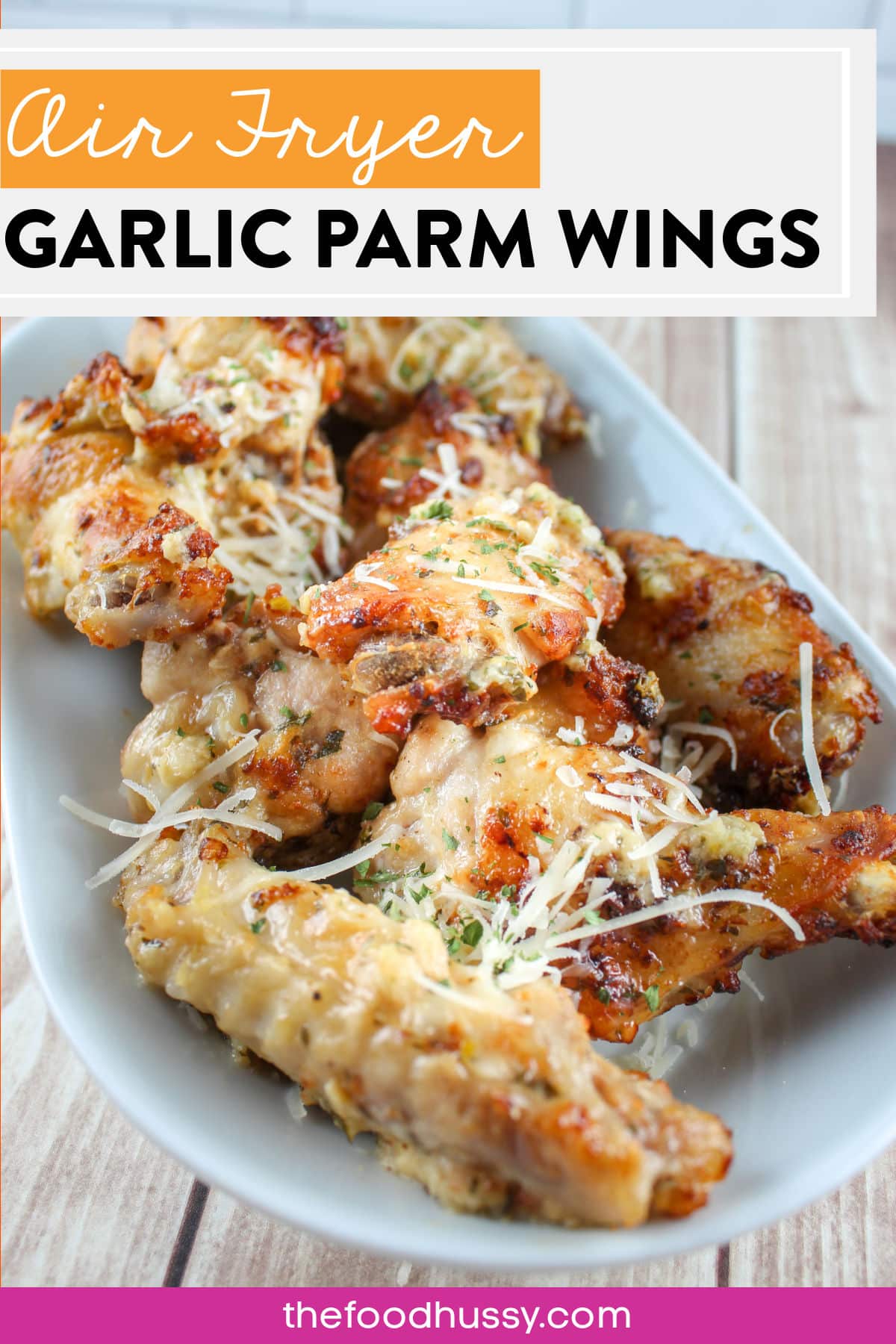 Air Fryer Garlic Parmesan Wings are like your favorite restaurant wings but they're made at home in less time than it takes for the delivery guy to bring them! Plus you can load them up with as much butter, garlic and Parmesan cheese as you want! via @foodhussy