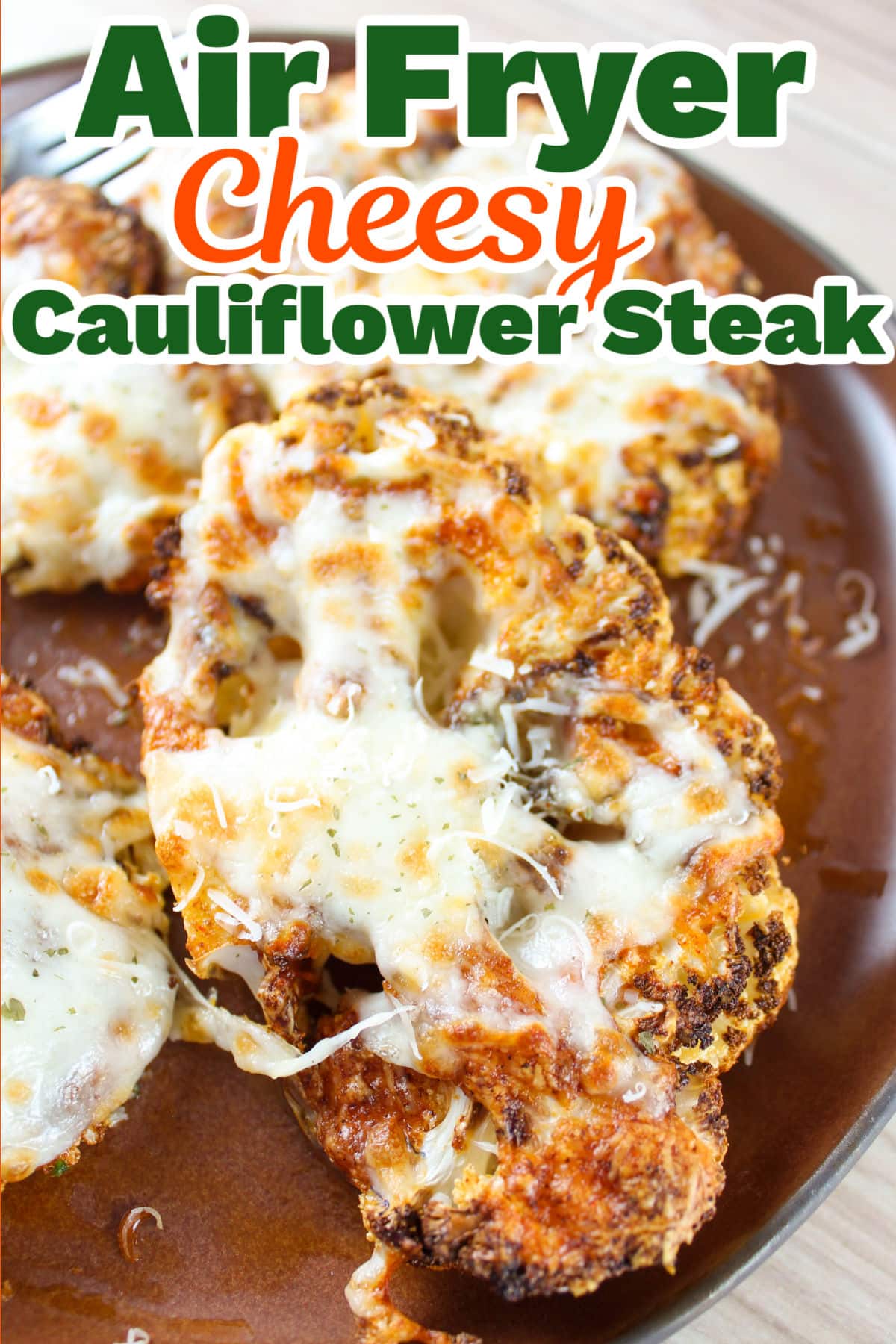 These Cheesy Cauliflower Steaks in the Air Fryer are so simple and really jazz up plain old cauliflower into a main dish everybody will enjoy! What a delicious low-carb meal!  via @foodhussy
