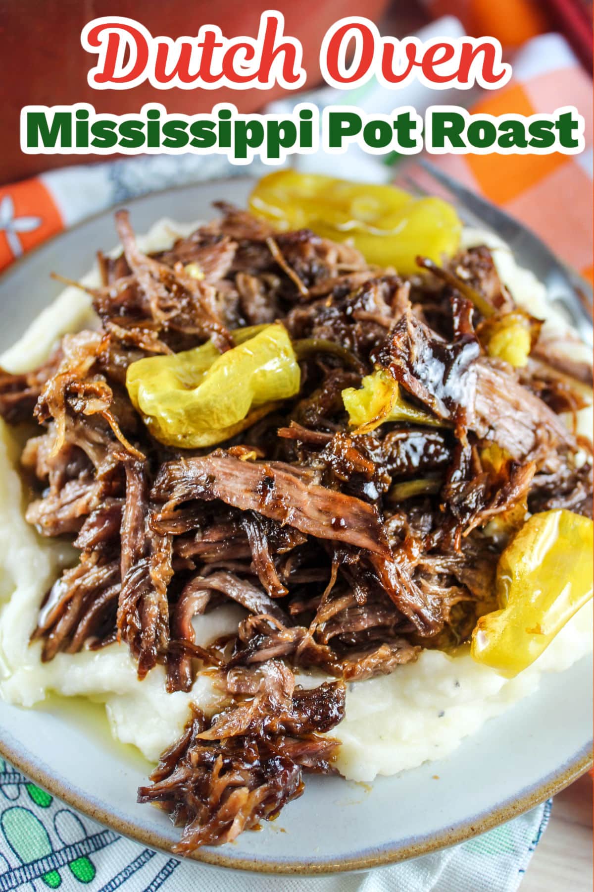 This Mississippi Pot Roast in the Dutch Oven is a meal the whole family will love. Whether you serve this juicy and rich shredded beef on mashed potatoes or sandwiches - everybody will be happily wiping their chins and asking for seconds! via @foodhussy