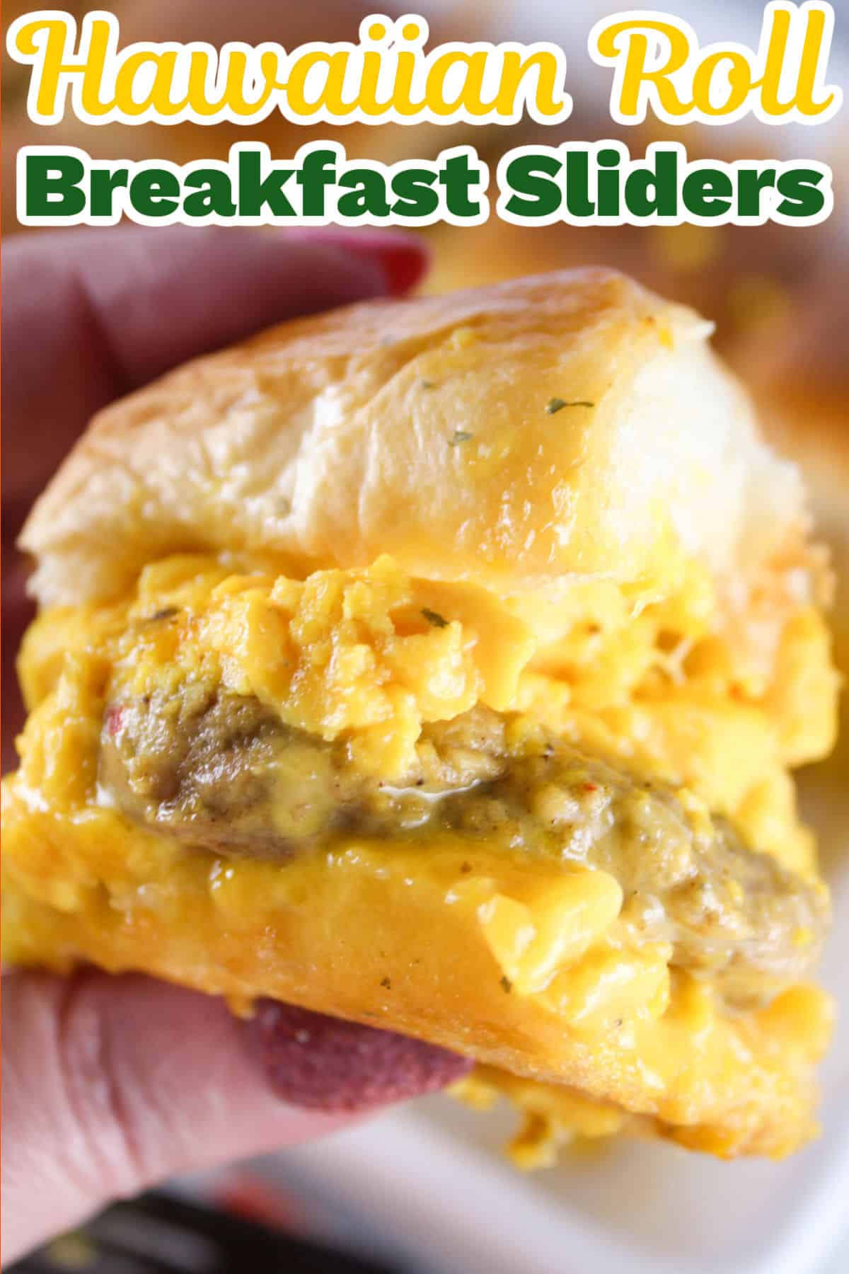 These Hawaiian Roll Breakfast Sliders are a delicious breakfast and a crowd favorite! Soft Hawaiian rolls, fluffy scrambled eggs, breakfast sausage, lots of cheese and a sweet buttery glaze all come together for a delicious breakfast treat. via @foodhussy