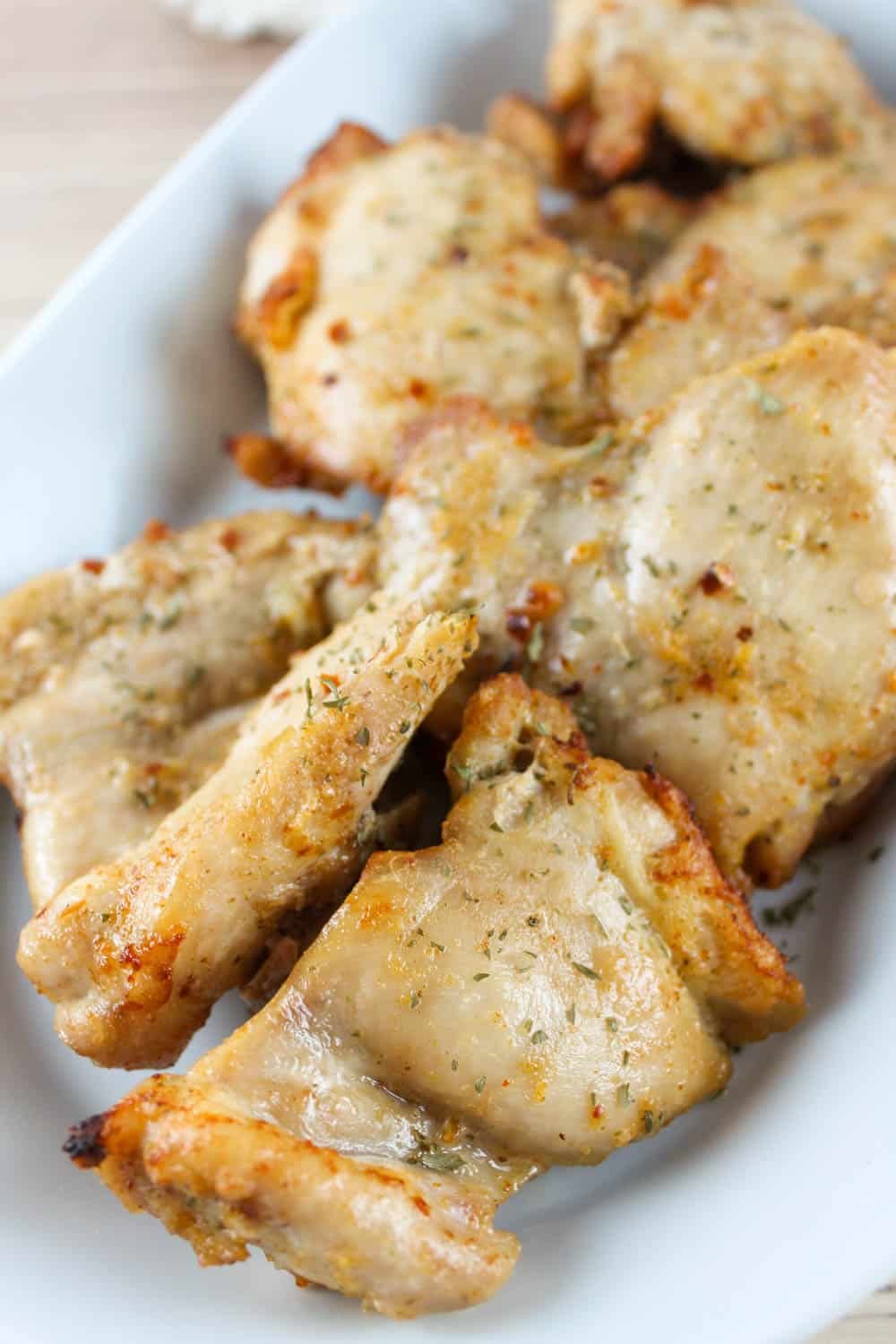 Air Fryer Boneless Skinless Chicken Thighs are a quick meal perfect for any weeknight! These juicy and tender chicken thighs are perfectly cooked in the air fryer in just 15 minutes. via @foodhussy