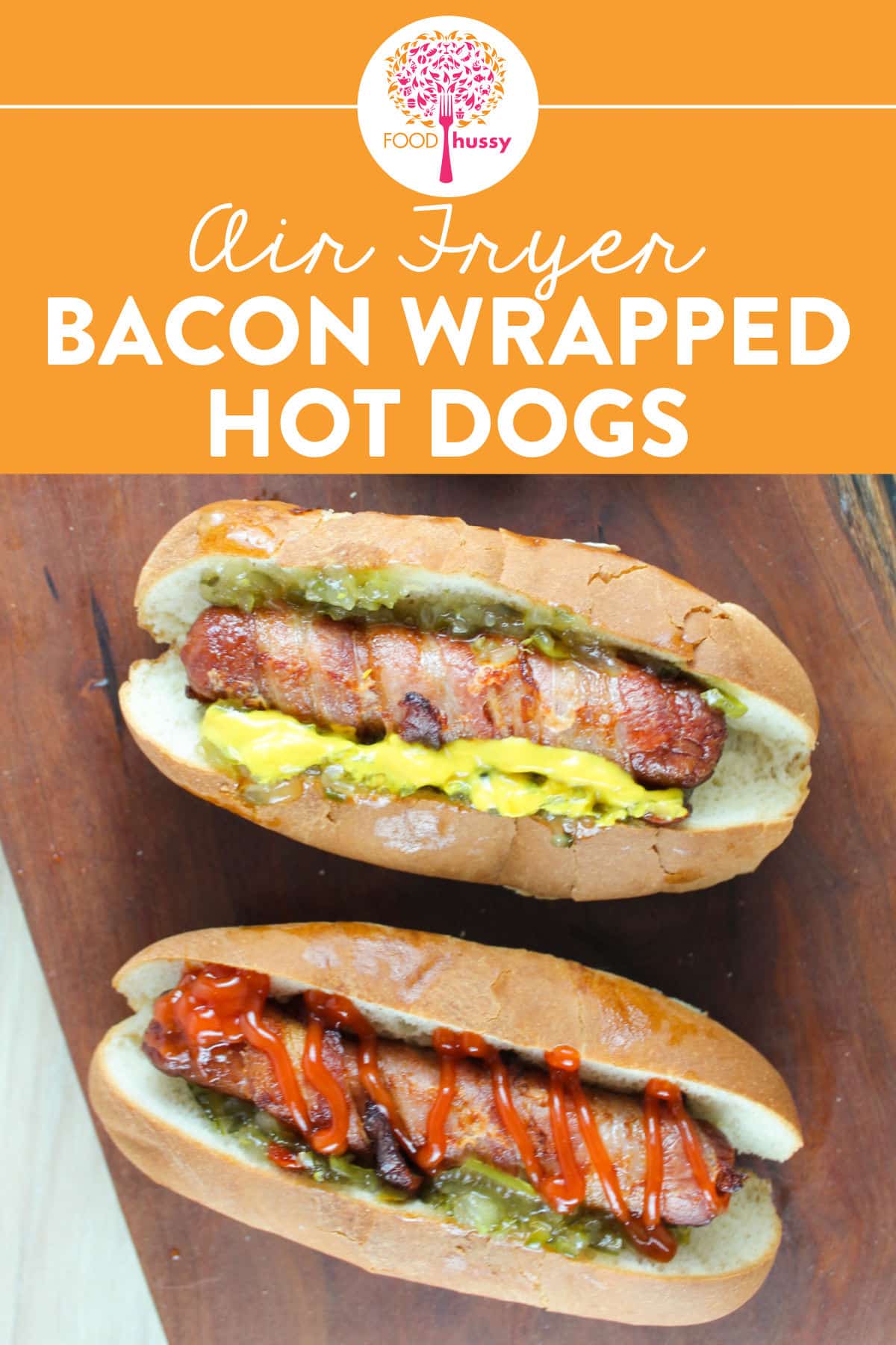 Bacon Wrapped Hot Dogs in the Air Fryer are a delicious, salty & savory way to make hot dogs even better! Plus - making them in the air fryer means they're quick!  via @foodhussy