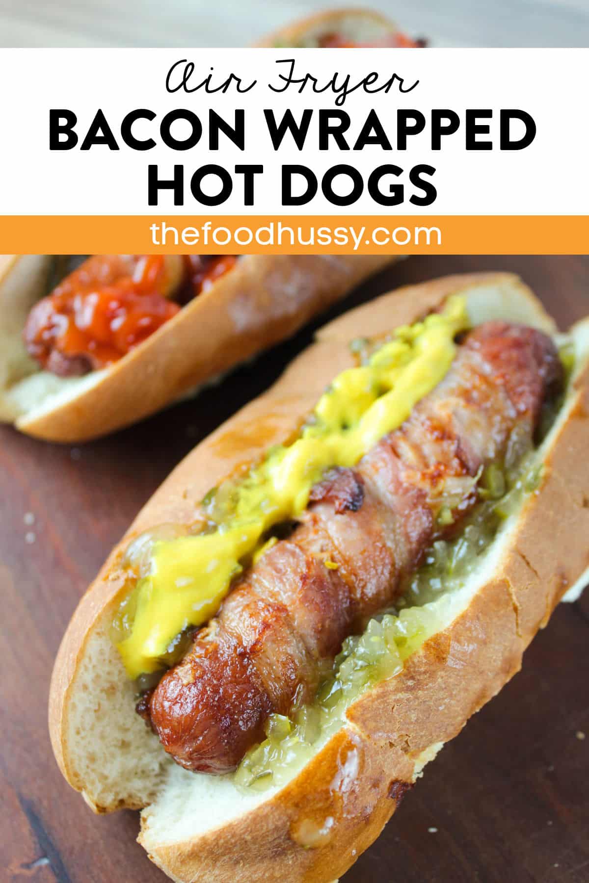 Bacon Wrapped Hot Dogs in the Air Fryer are a delicious, salty & savory way to make hot dogs even better! Plus - making them in the air fryer means they're quick!  via @foodhussy