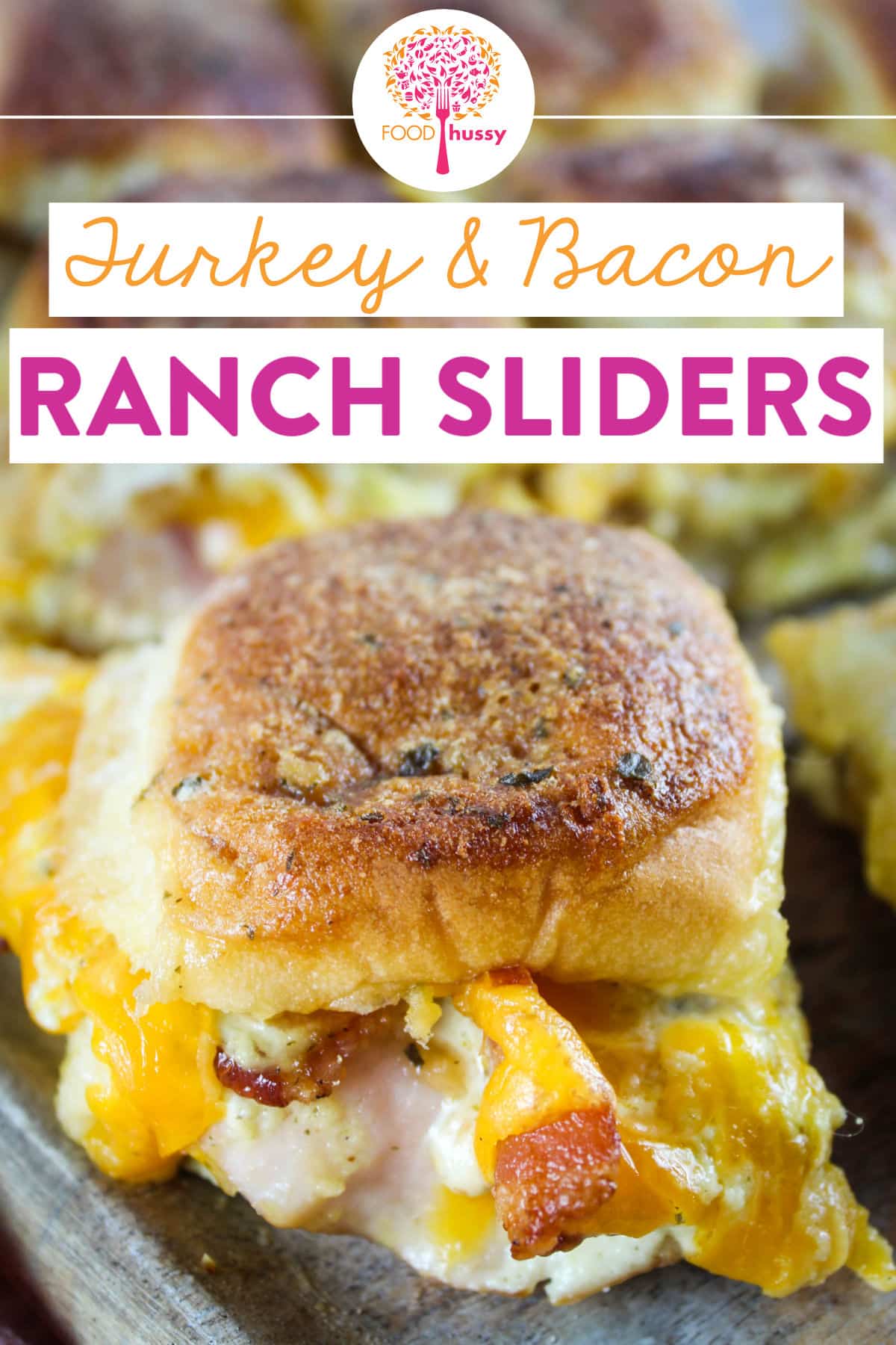 These Turkey Bacon Ranch Sliders are my favorite sliders! Every bite is so delicious - full of lean sliced turkey, crispy meaty bacon, melty cheddar cheese and loads of ranch dressing! Turkey, bacon & ranch are a great combination of flavors! via @foodhussy
