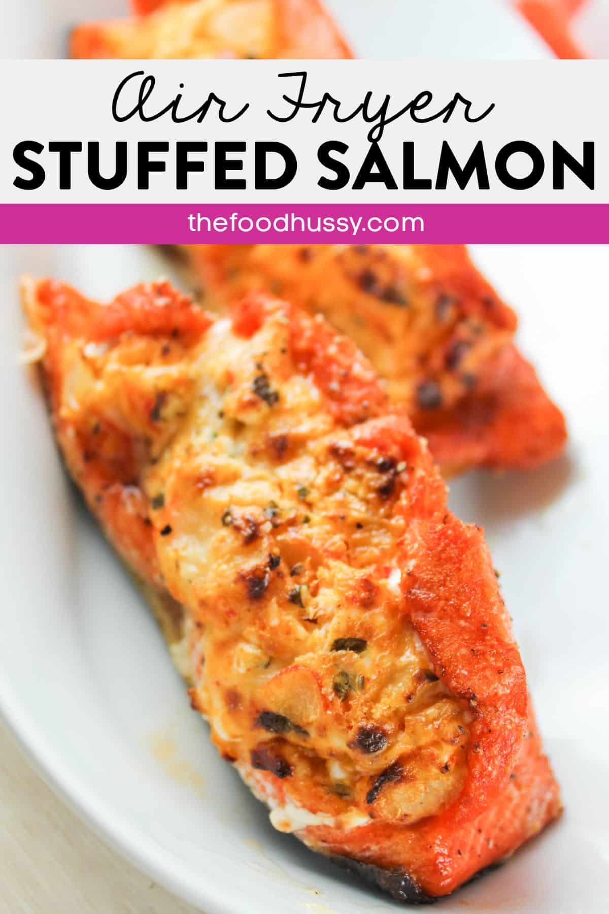 Stuffed Salmon in the Air Fryer is a delicious, healthy and FAST dinner you can make any night of the week! This delicious salmon is stuffed with cream cheese, cheese, crab, dijon mustard and my favorite seasonings! via @foodhussy