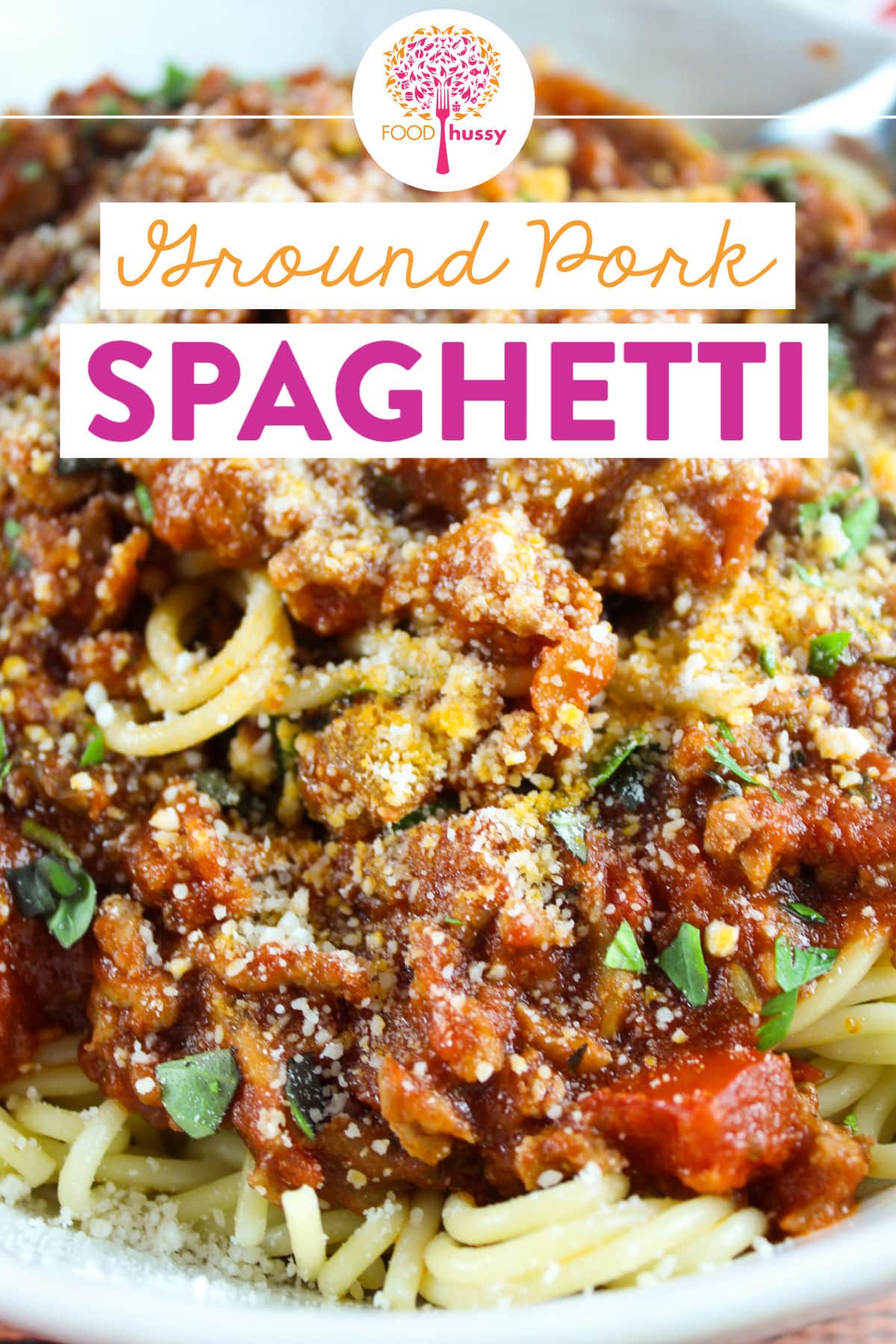 This Ground Pork Spaghetti will remind you of a rich bolognese sauce at a fancy Italian restaurant - but you'll know you made it at home and it's easy!!! Full of chunky veggies, affordable ground pork and delicious San Marzano tomatoes! via @foodhussy