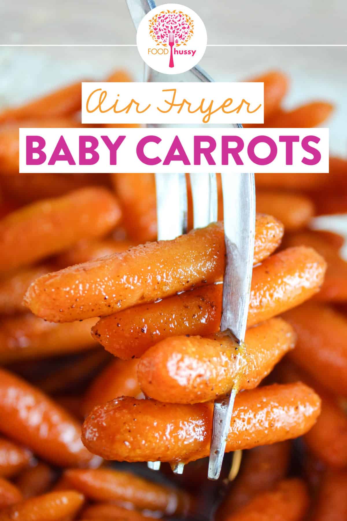 Air Fryer Baby Carrots are a delicious side dish everyone will love! It's got a little sweet, a little savory and a little spicy and it's done in less than 15 minutes! And come on - who doesn't love a little syrup with dinner?! via @foodhussy