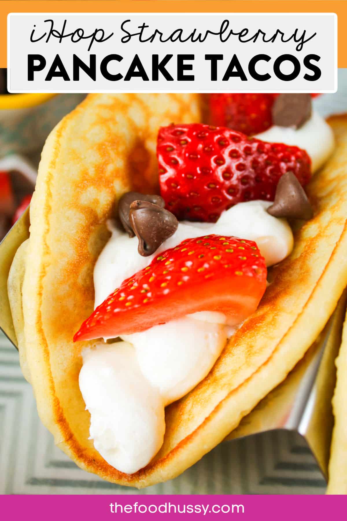These copycat IHOP Strawberry Cheesecake Pancake Tacos are silver dollar pancakes filled with creamy cheesecake mousse and topped with fresh sliced strawberries and chocolate chips. Light, creamy and delicious -  a pancake lover's dream! via @foodhussy