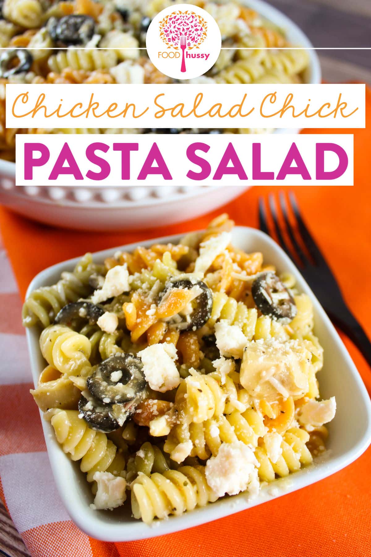 Chicken Salad Chick Pasta Salad is an easy-to-make, potluck-perfect pasta salad! Tri-color rotini pasta tossed with Italian dressing, feta & parmesan cheese, black olives & artichoke hearts. via @foodhussy