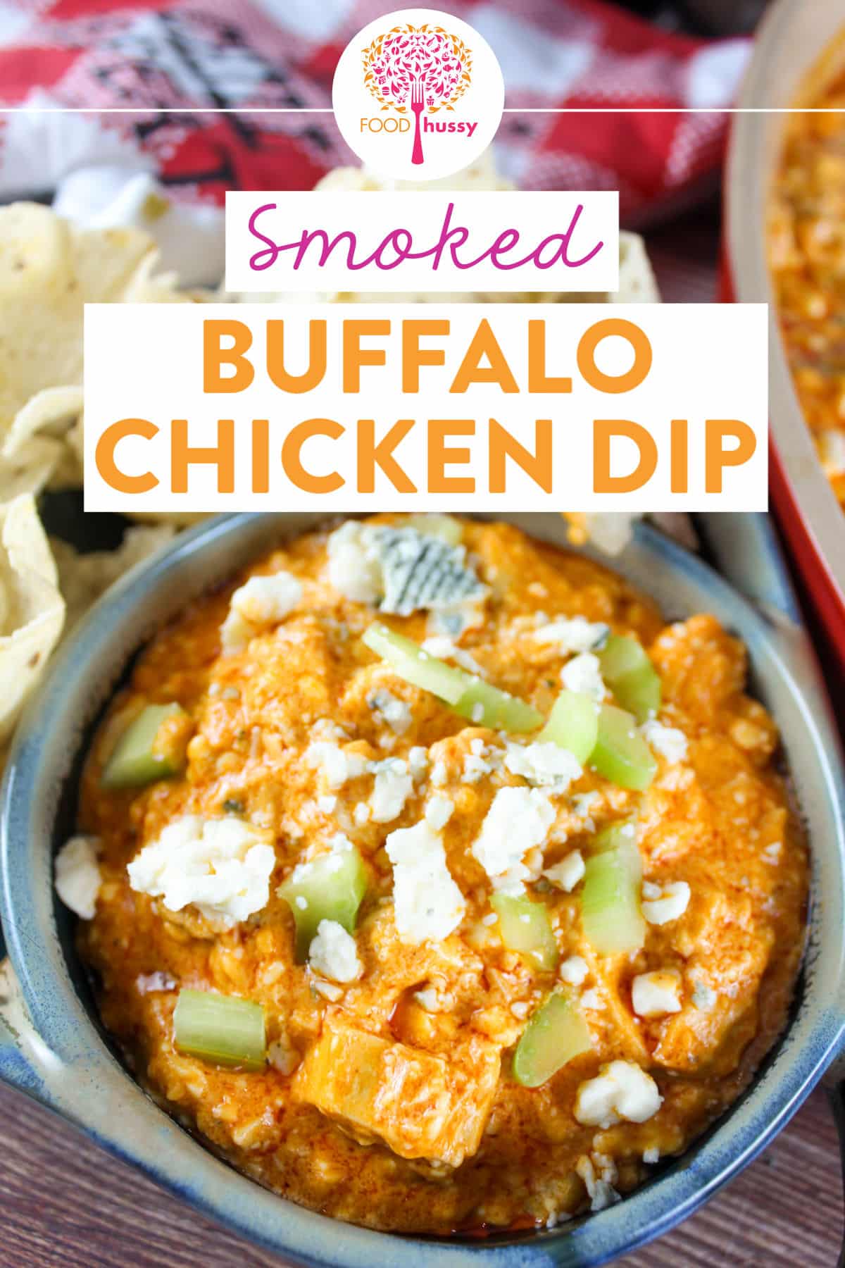This Smoked Buffalo Chicken Dip is everything you love - cheesy, spicy, zingy, crunchy and just plain delicious! This spicy chicken dip is the favorite for every party!  via @foodhussy