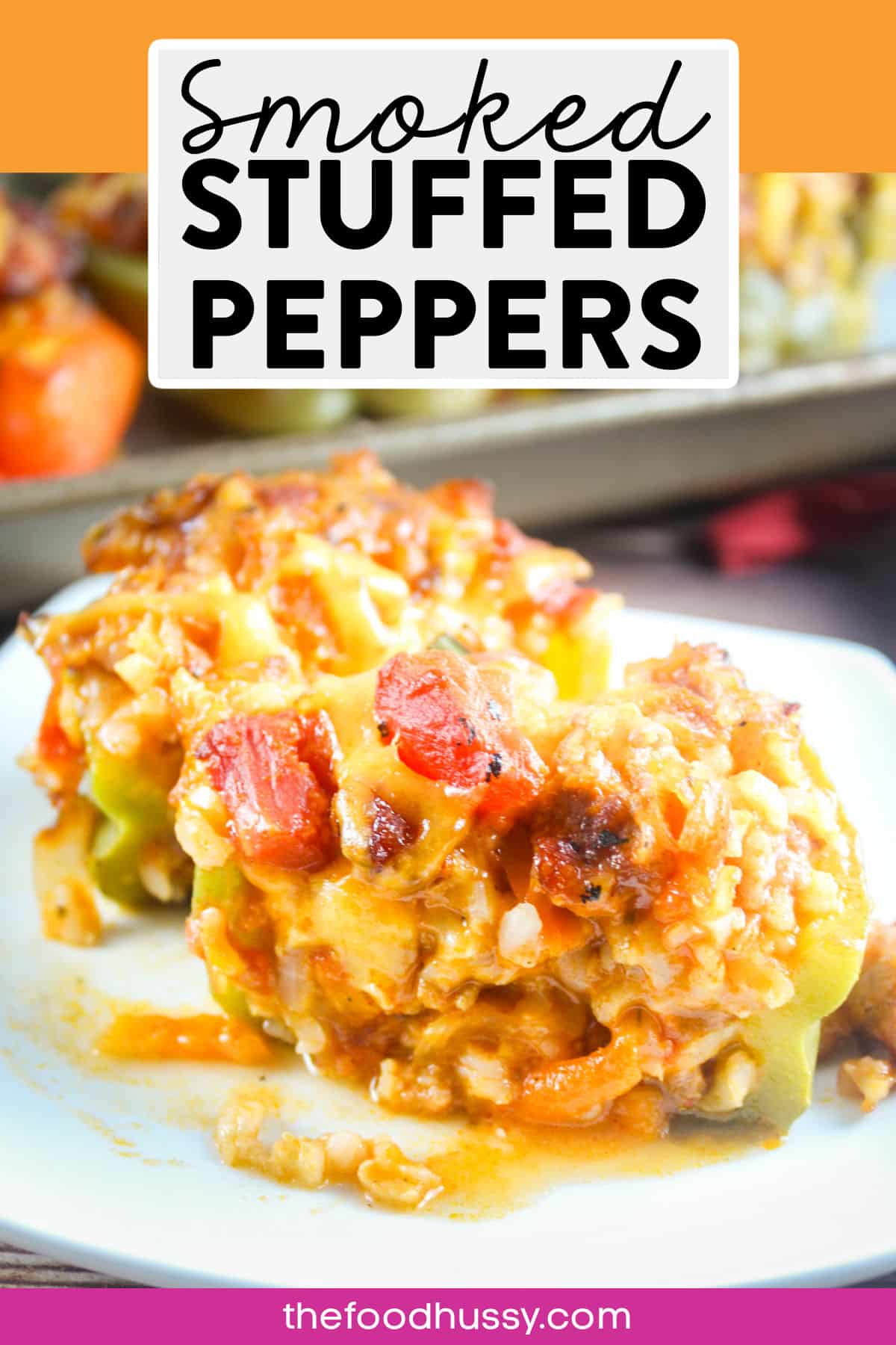 Smoked Stuffed Peppers are my favorite dinner because its a full meal in an edible bowl! Stuffed with sausage, rice, vegetables, rice and cheese - they take on a delicious smoky flavor from the Traeger! via @foodhussy