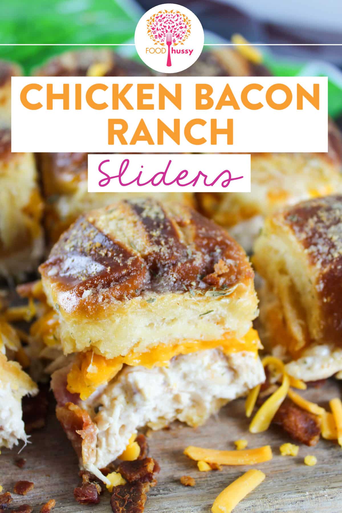 These Chicken Bacon Ranch Sliders are so tasty! Full of rotisserie chicken, melty cheddar cheese, smoky bacon and creamy ranch dressing! These sliders are great for a weeknight dinner or a potluck with friends.  via @foodhussy