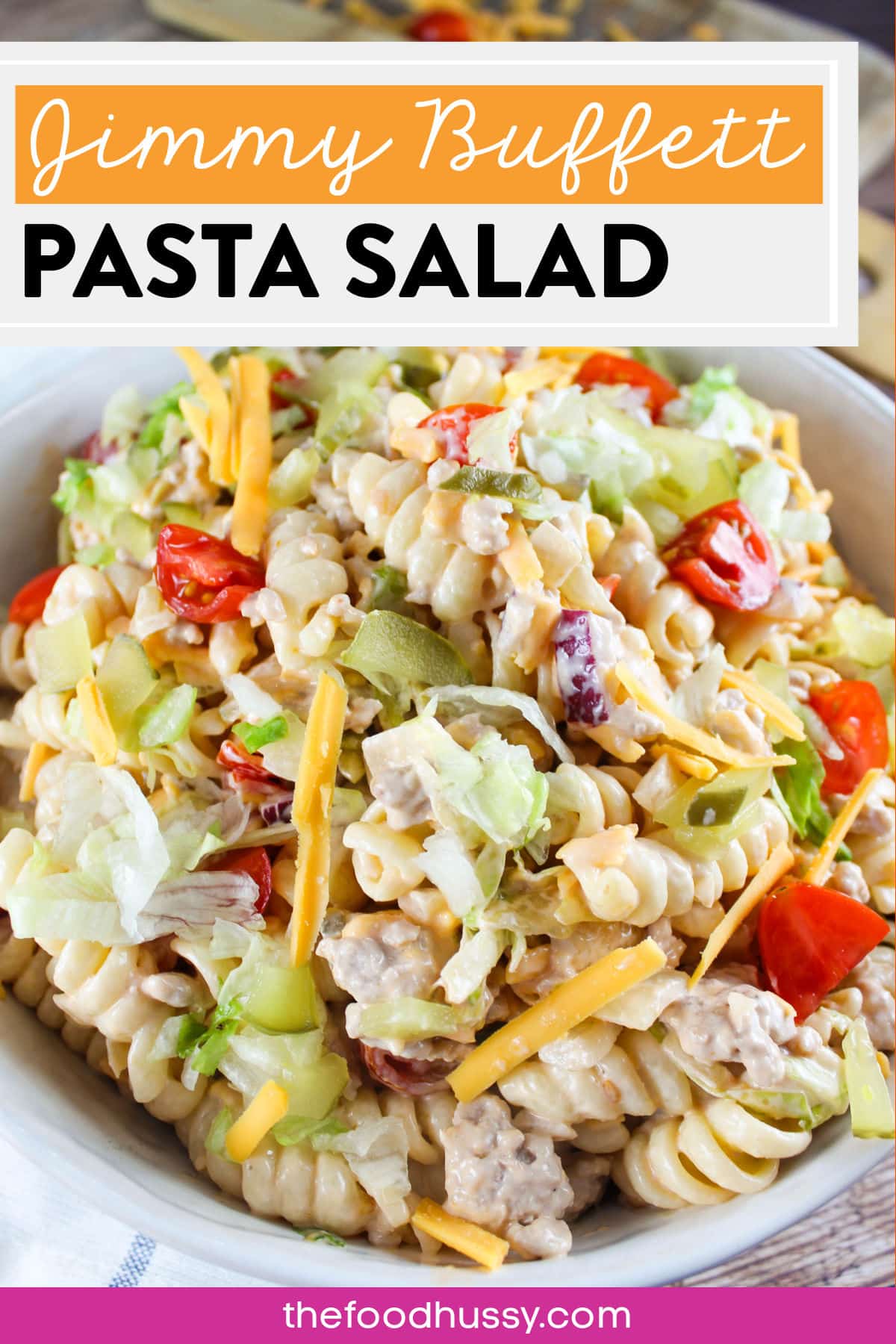 Jimmy Buffett Pasta Salad is a delicious main course or side dish! Filled with everything you love about a cheeseburger: burger, pickles, cheese, onions and more! Whether you're wanting a fun dinner or a perfect potluck dish - this is it!
 via @foodhussy