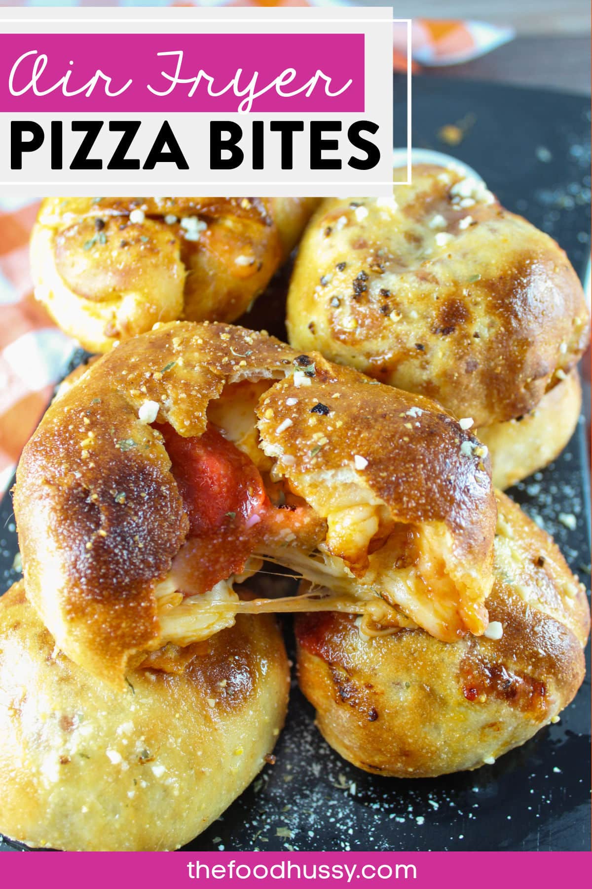 These Air Fryer Pizza Bites will be loved by kids and grown-ups alike at the dinner table. They're fun to pull apart and discover what's inside but also filling enough for the adults! These are filled to the brim with pizza sauce, pepperoni and lots of cheese! via @foodhussy