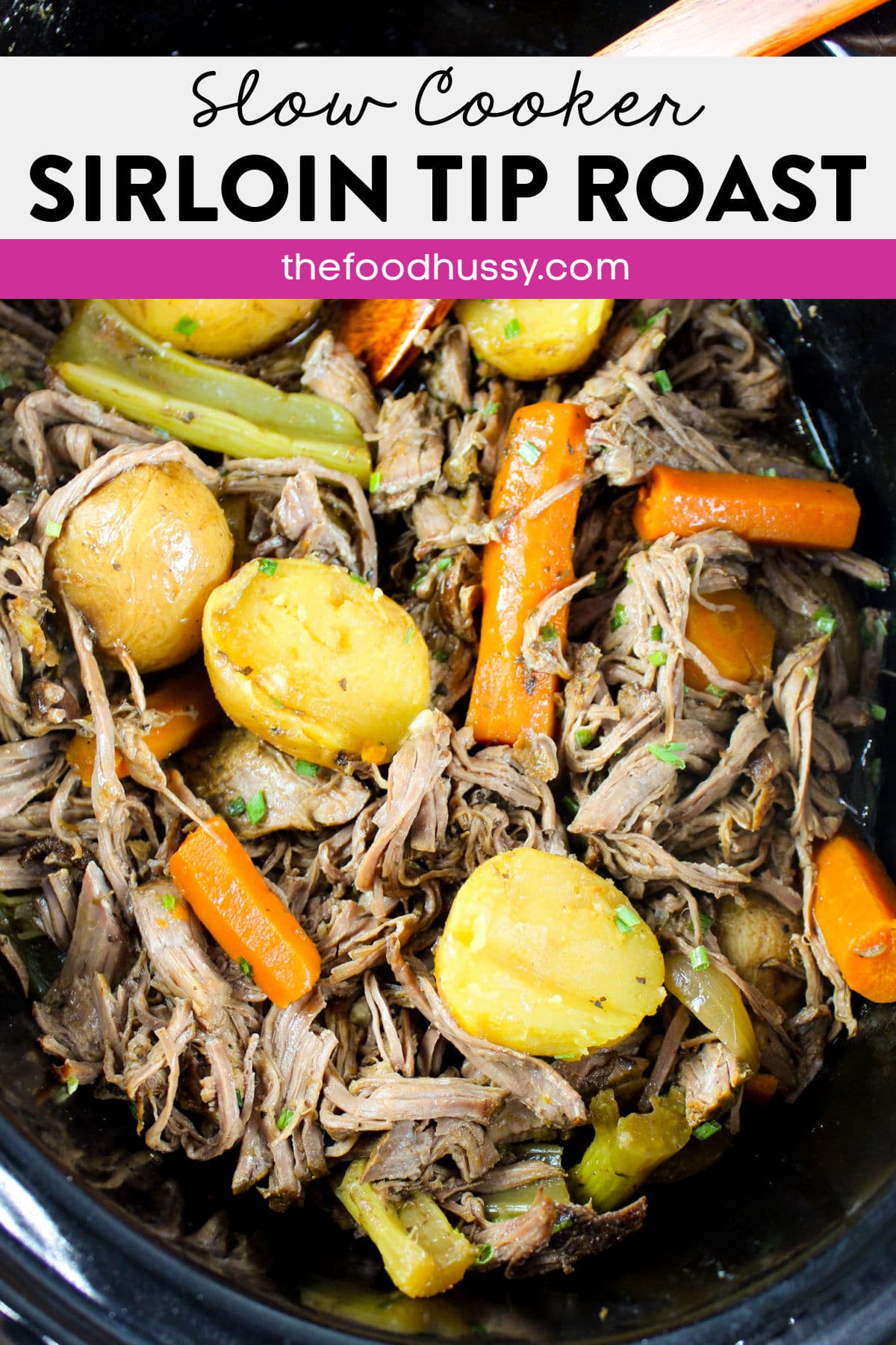 This Slow Cooker Beef Sirloin Tip Roast is the fall apart pot roast you'll remember from your mom's kitchen! Tender shredded beef with carrots, potatoes and a rich au jus sauce will have the entire family at the dinner table - forks in hand! via @foodhussy