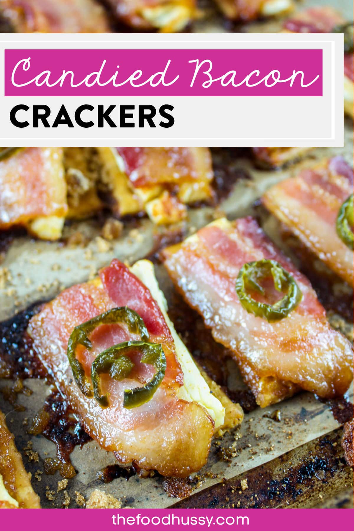 These Candied Bacon Crackers are a delicious appetizer for holidays, game days or any party! Crackers layered with cream cheese, thick cut bacon, bbq seasoning and brown sugar for the perfect bite of savory & sweet snack! via @foodhussy