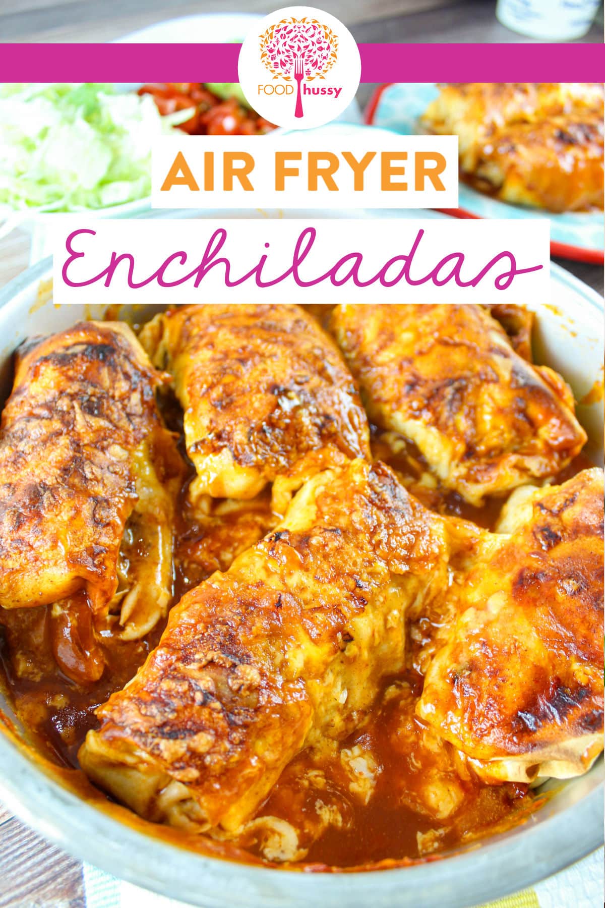 These Air Fryer Enchiladas are so tasty! They're full of meat, cheese and sauce on the inside and then coated with sauce and more cheese on top! The air fryer speeds it up and they cook in just 10 minutes! via @foodhussy