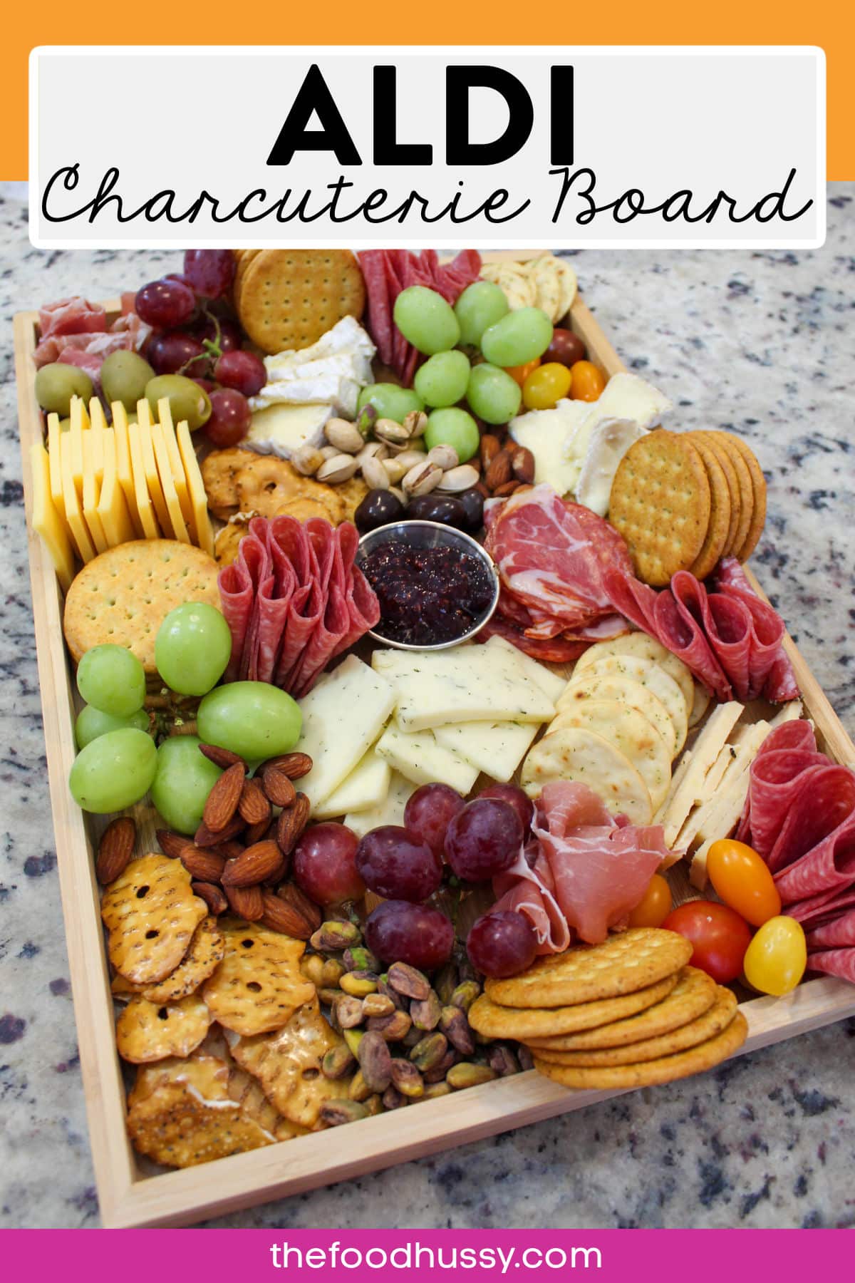 Creating an Aldi Charcuterie Board is easy and affordable! Grab your cart and explore the snacks, deli and produce sections to put together a platter of delicious meats, cheeses, crackers and more - on a budget! via @foodhussy