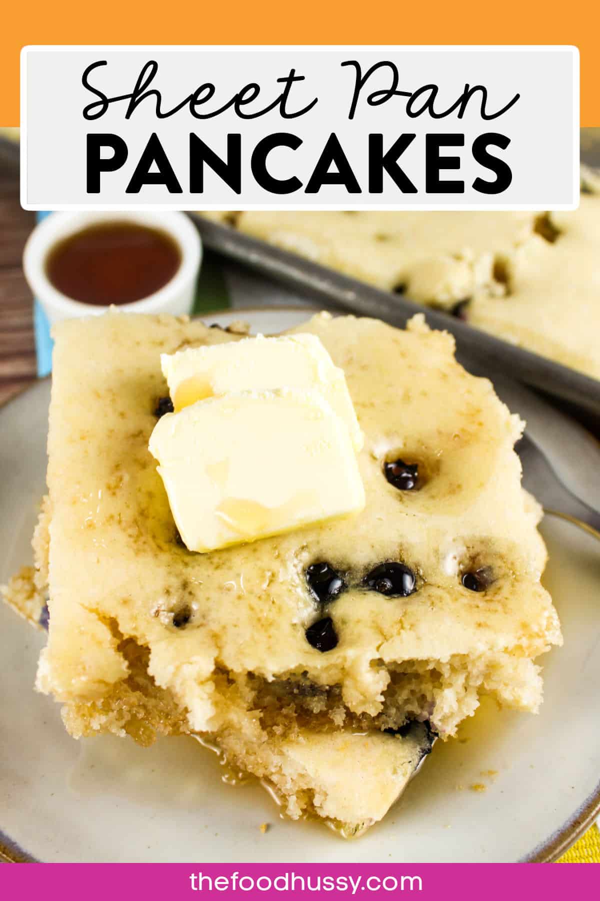Making Sheet Pan Pancakes from a Mix is simpler and gets you a whole pan full of light & fluffy pancakes with no work! Load them up with toppings like blueberries or chocolate chips to make everyone happy and ready to dig in! via @foodhussy