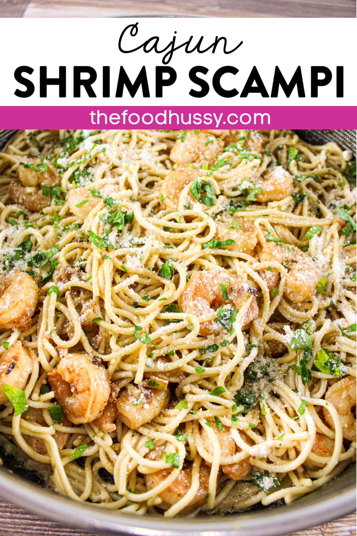 Cajun Shrimp Scampi is creamy, garlicky and just a little spicy! Scampi style shrimp over spaghetti in a delicious light cream sauce. Plus - it's a quick dinner - ready in less than 15 minutes.  via @foodhussy