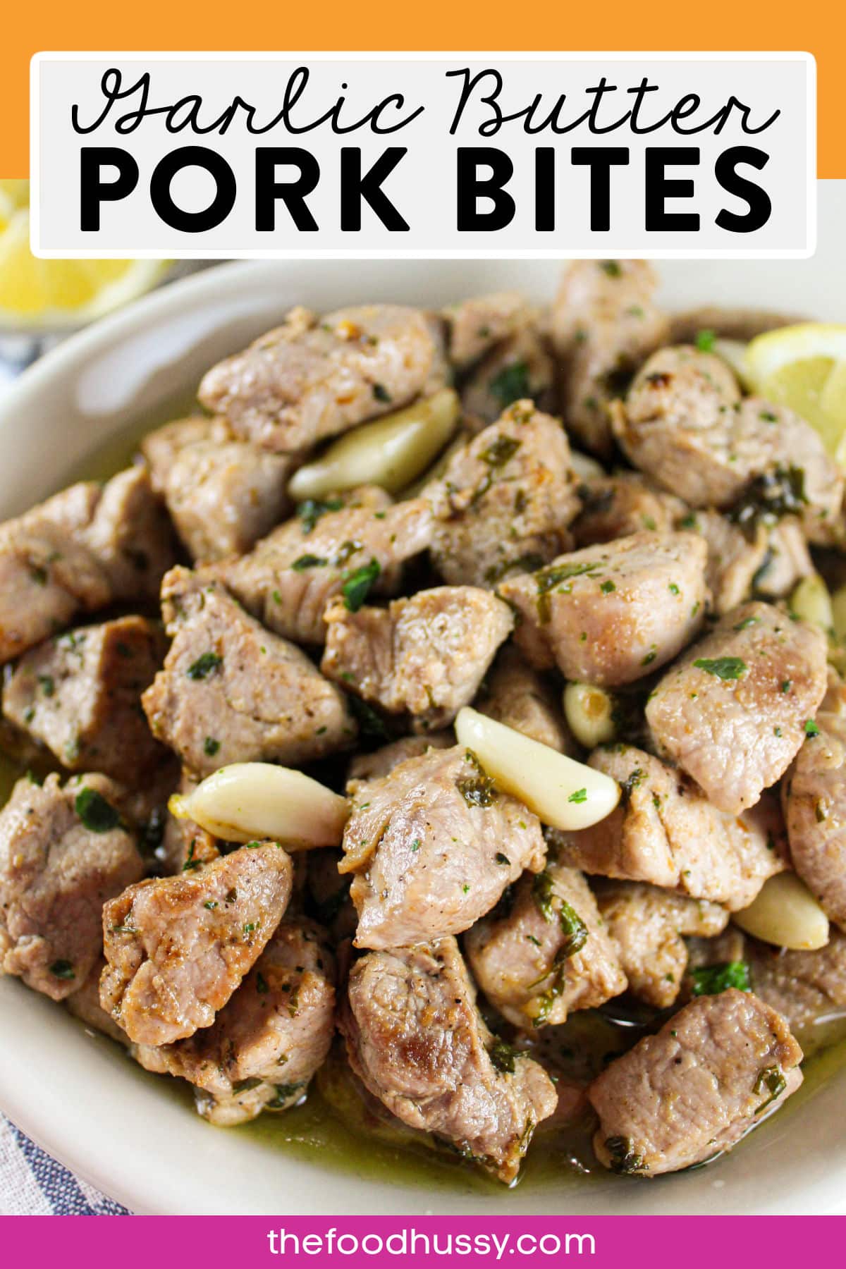 Garlic Butter Pork Bites are so easy to make and wow - they are delicious! Tender, juicy bites of pork smothered in a garlic butter sauce. Fresh herbs and lemon add freshness to every bite! via @foodhussy