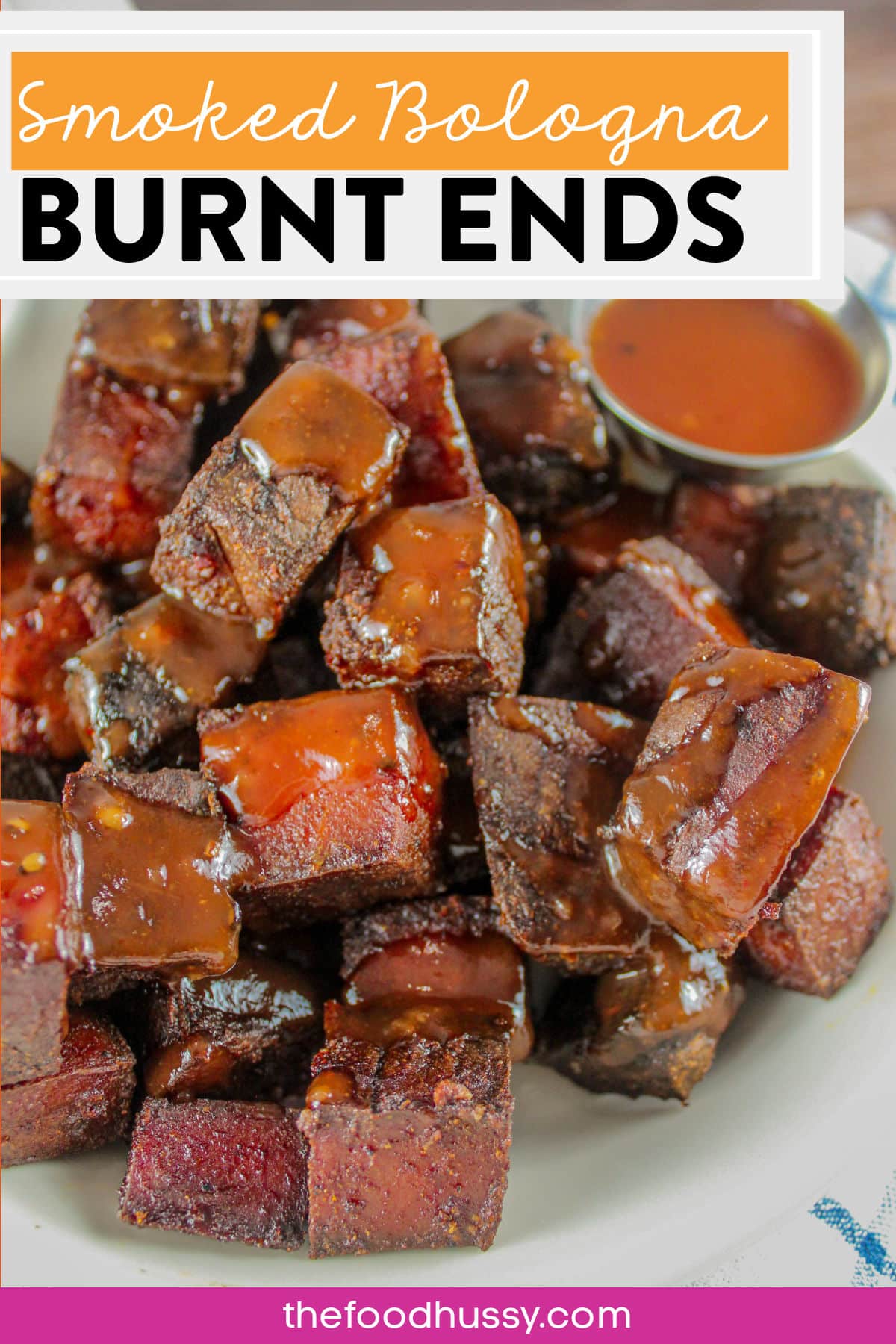 Traeger Smoked Bologna Burnt Ends are a fun and easy appetizer for any BBQ or summer party! Toss them in mustard and seasoning and then pop them on the smoker. Great to make when you want to smoke multiple things at the same time! Take these off early and snack away! via @foodhussy