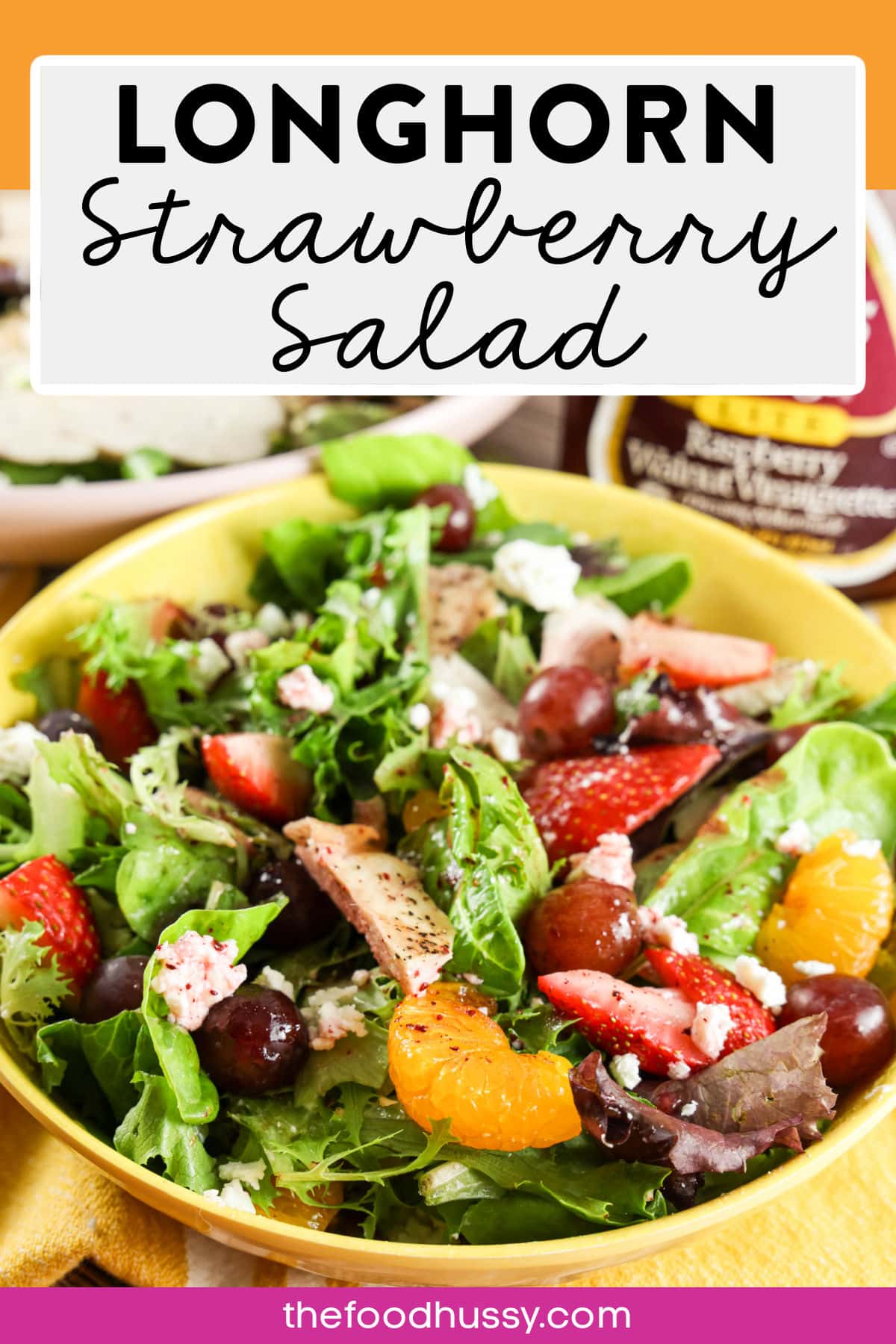 Longhorn Steakhouse Grilled Chicken & Strawberry Salad is a delicious summer salad that you can make at home any time of year! Loaded with grilled chicken, fresh strawberries, red grapes, mandarin oranges, feta cheese and more!  via @foodhussy