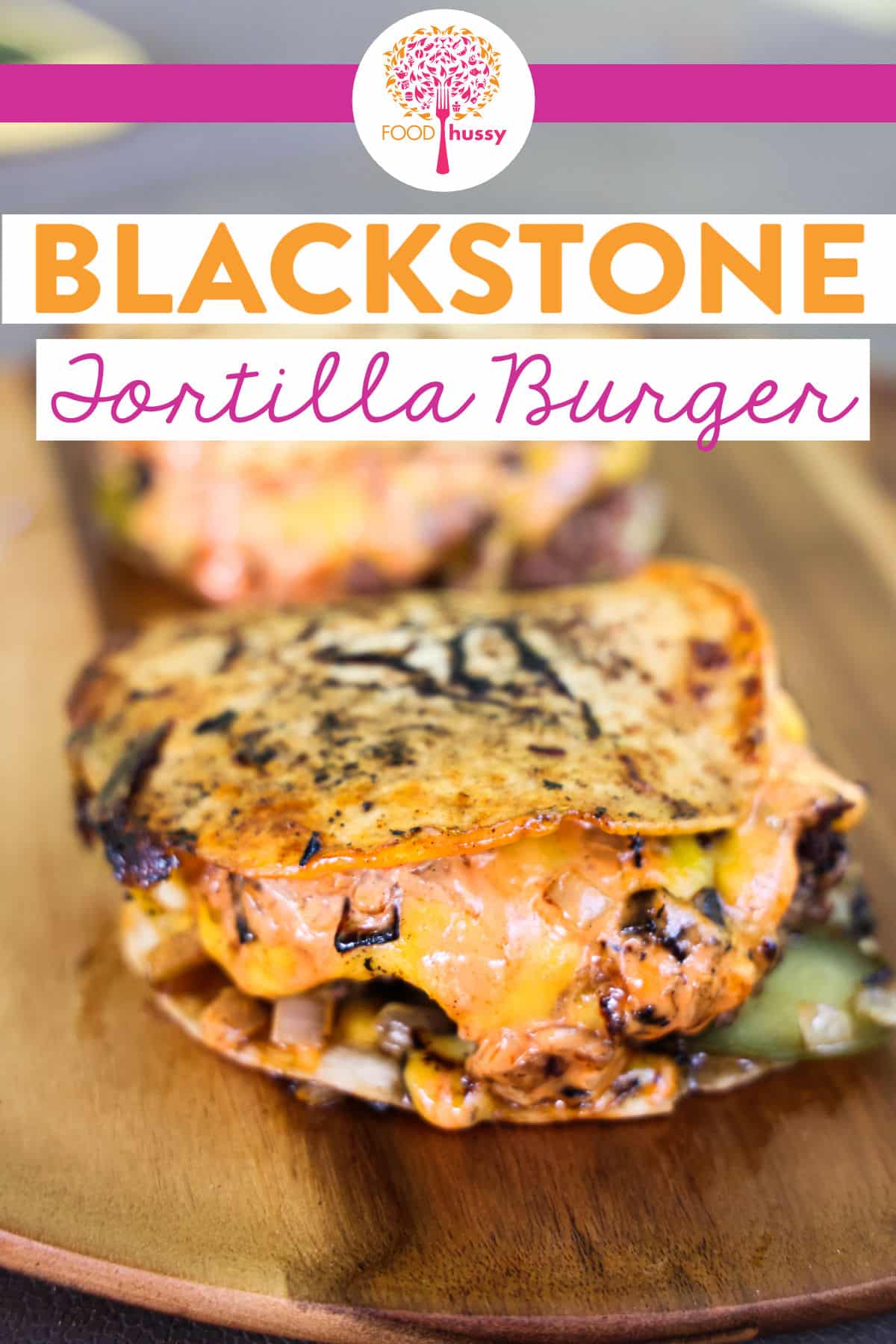 This Blackstone Tortilla Burger is the thick, juicy, messy, melty cheese burger you love but served up on a tortilla instead of a bun and made on your Blackstone griddle! Loaded up with a super simple burger sauce, cheese, bacon, pickles & onions - you will definitely need extra napkins! via @foodhussy