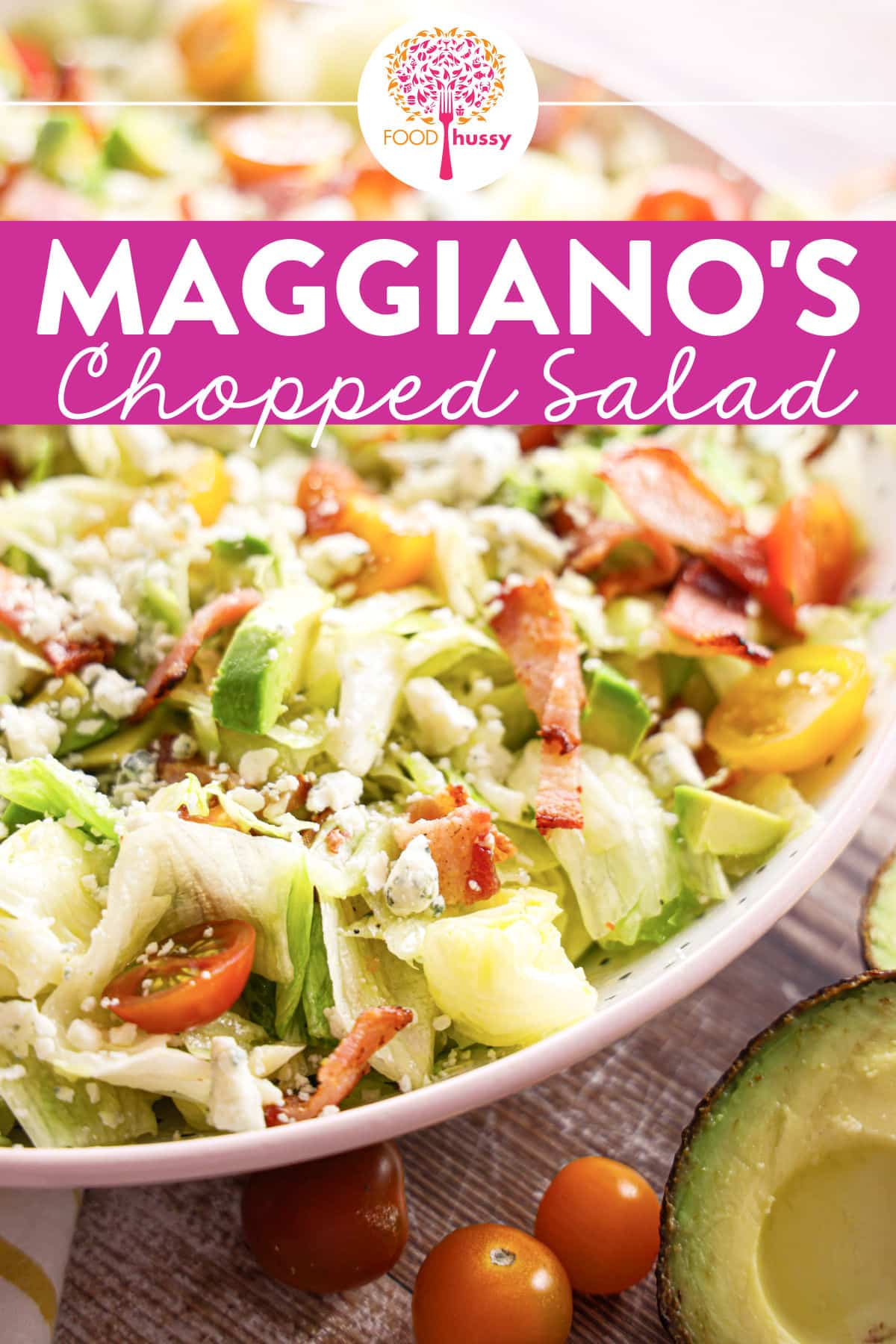 Maggiano's Chopped Salad is a classic and a fan favorite! Crisp lettuce topped with tomatoes, bacon, avocado and blue cheese tossed in a sweet and savory light house vinaigrette. Add grilled chicken or salmon to make it a meal! via @foodhussy
